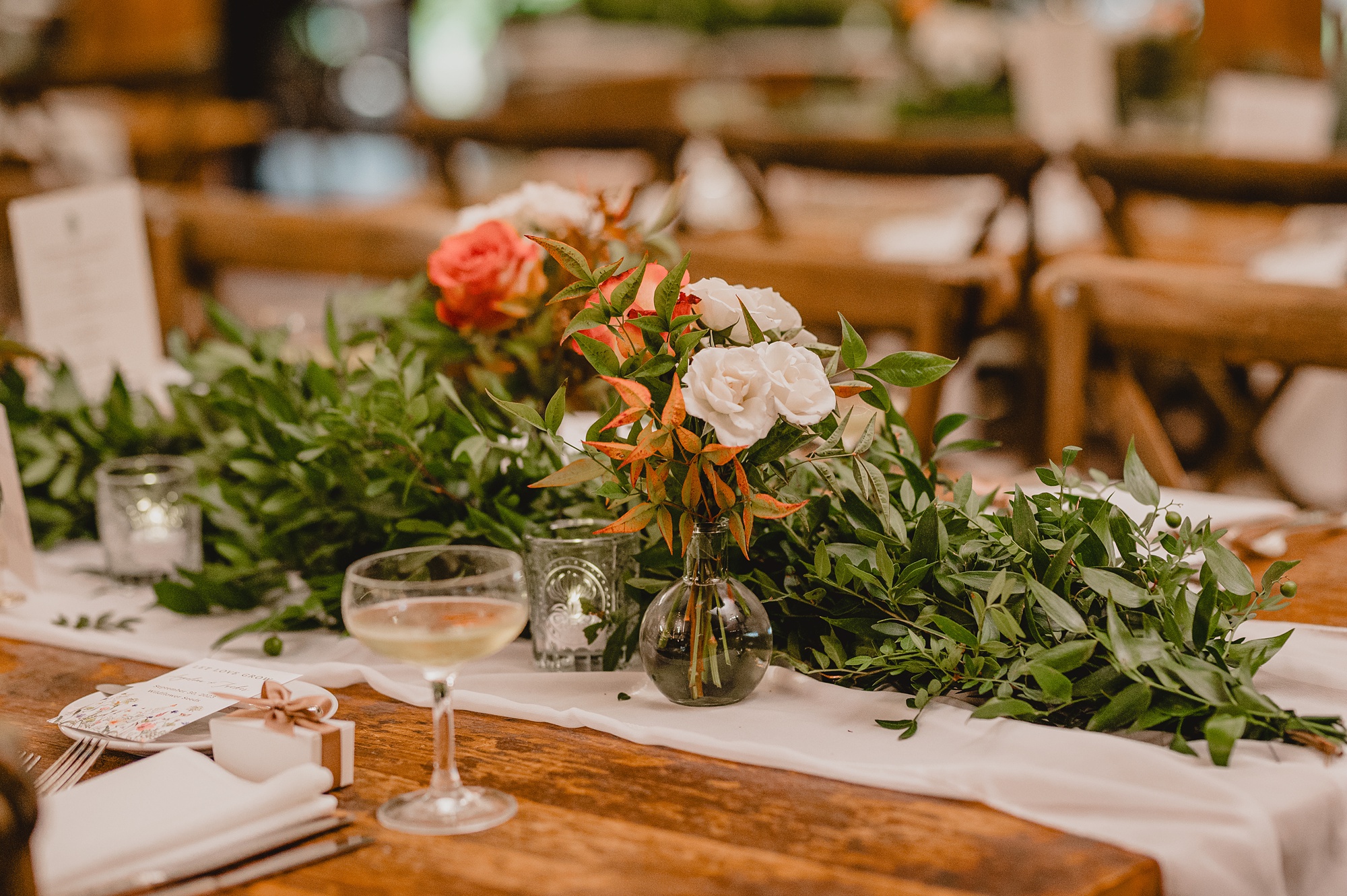 pink and white flowers in center of table for reception at Waterloo Village