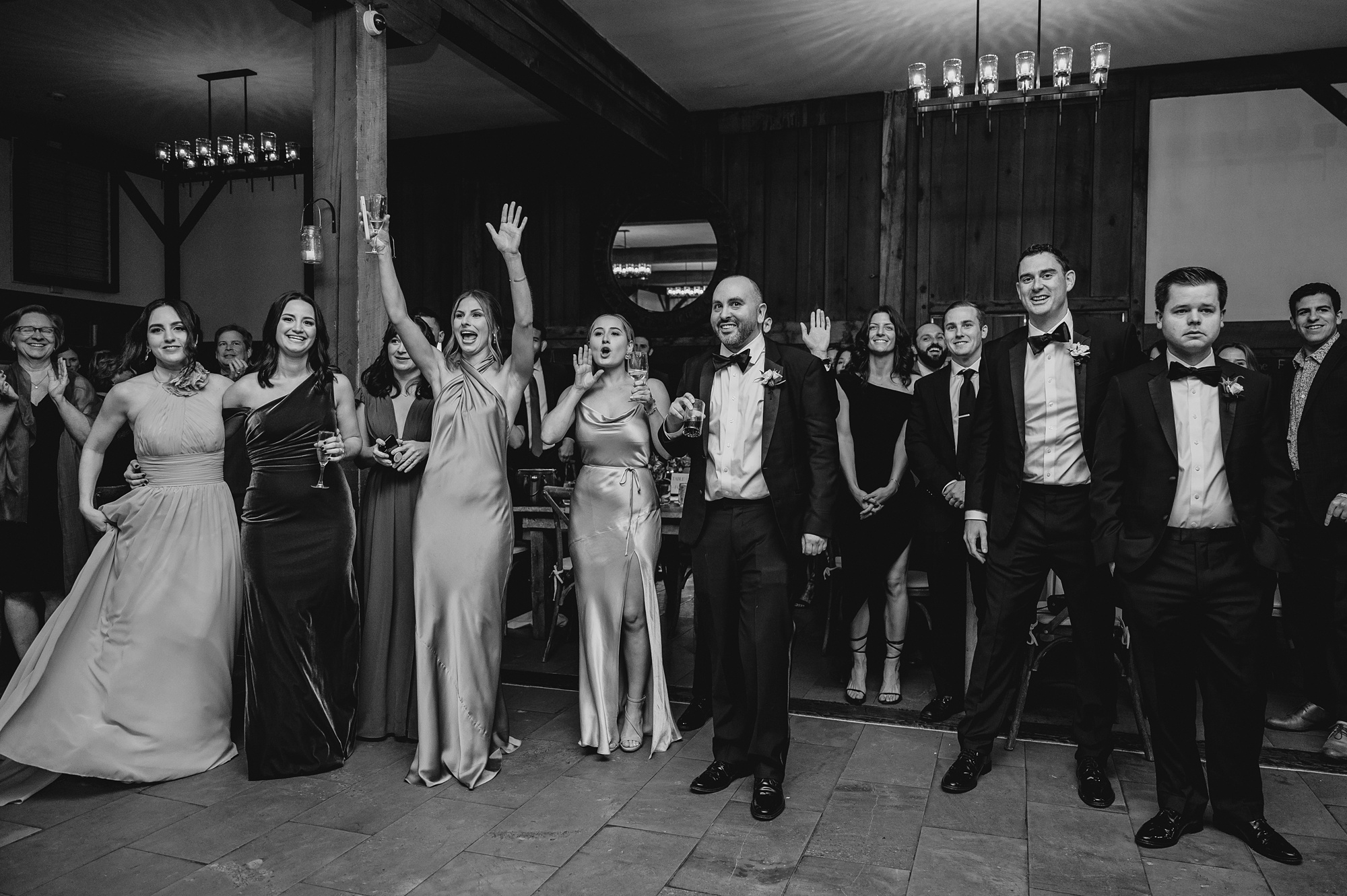wedding guests cheer on dance floor in New Jersey 