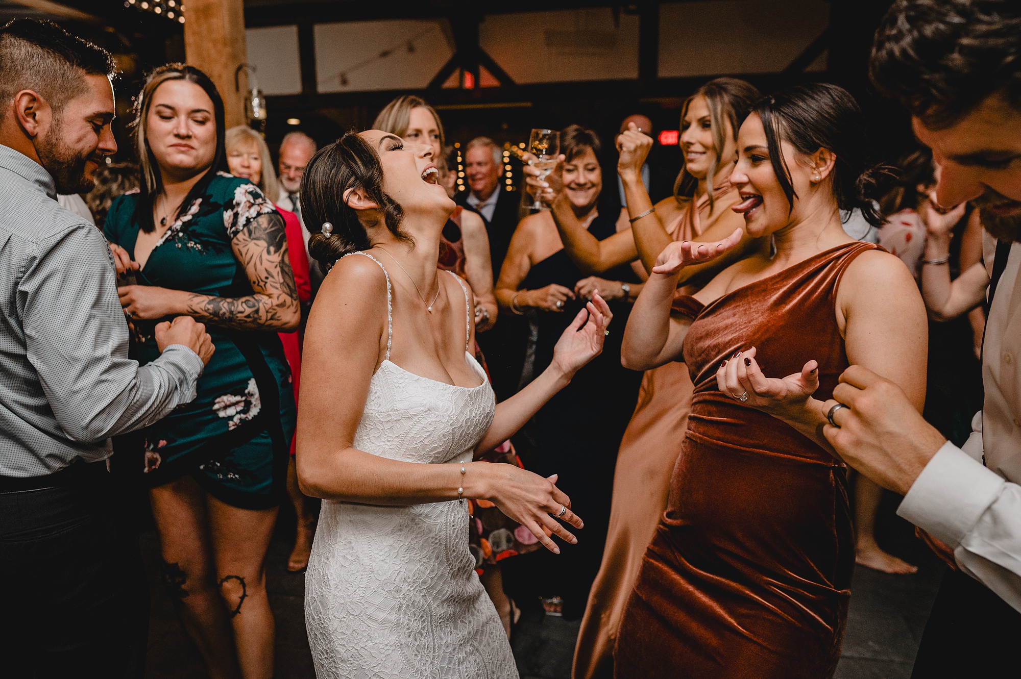 bride and groom dance with guests at NJ wedding reception 