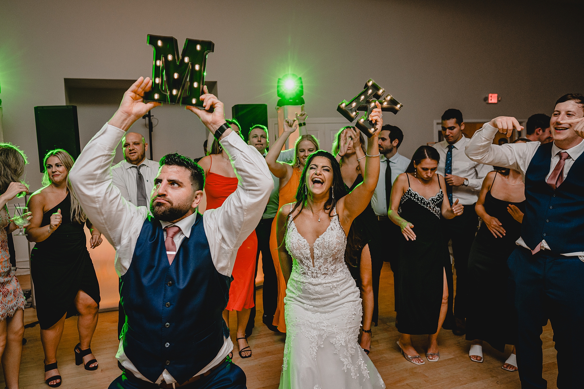 newlyweds dance with wedding guests at Sparta NJ wedding reception