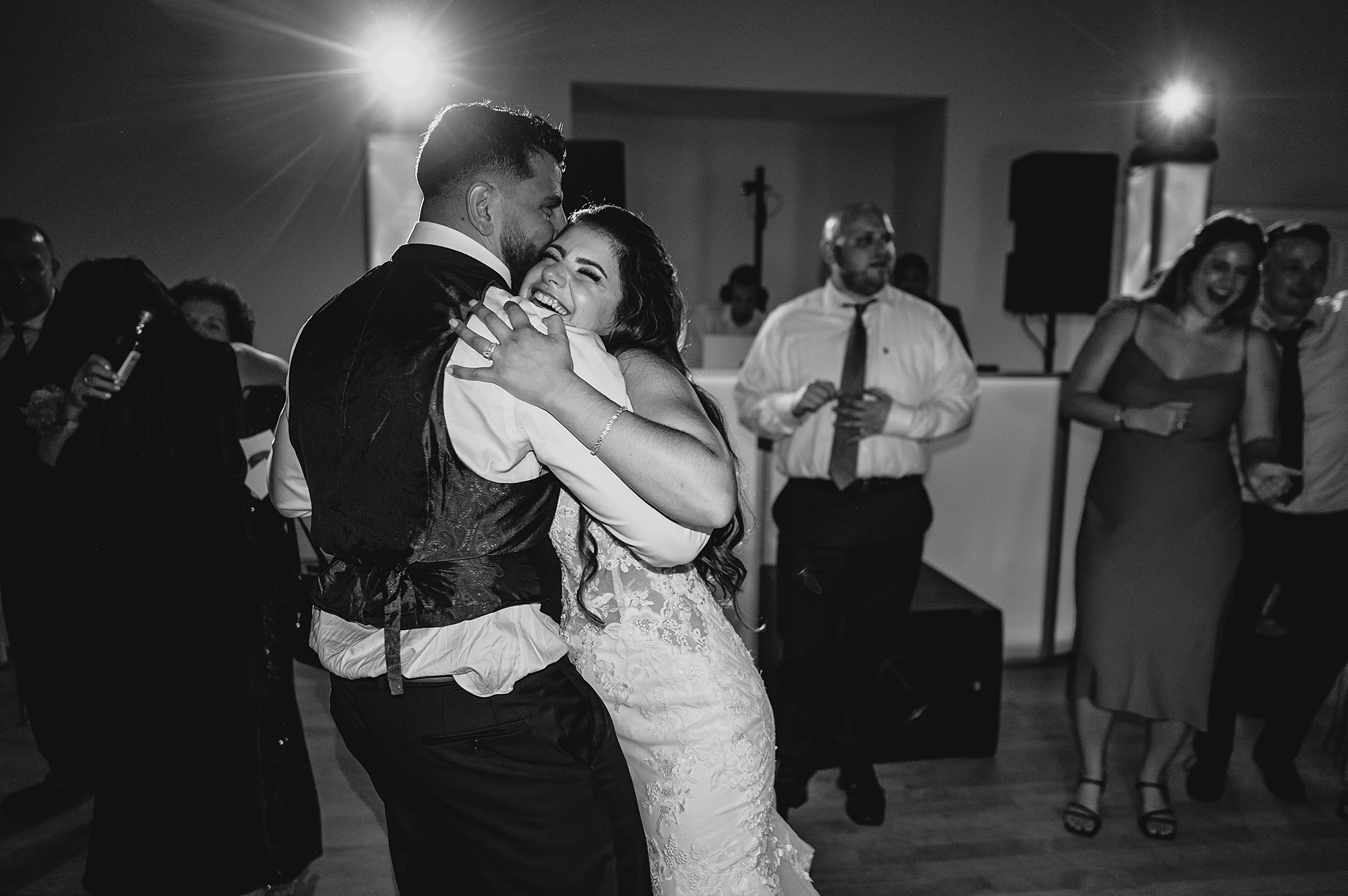 bride and groom dance together at NJ wedding reception