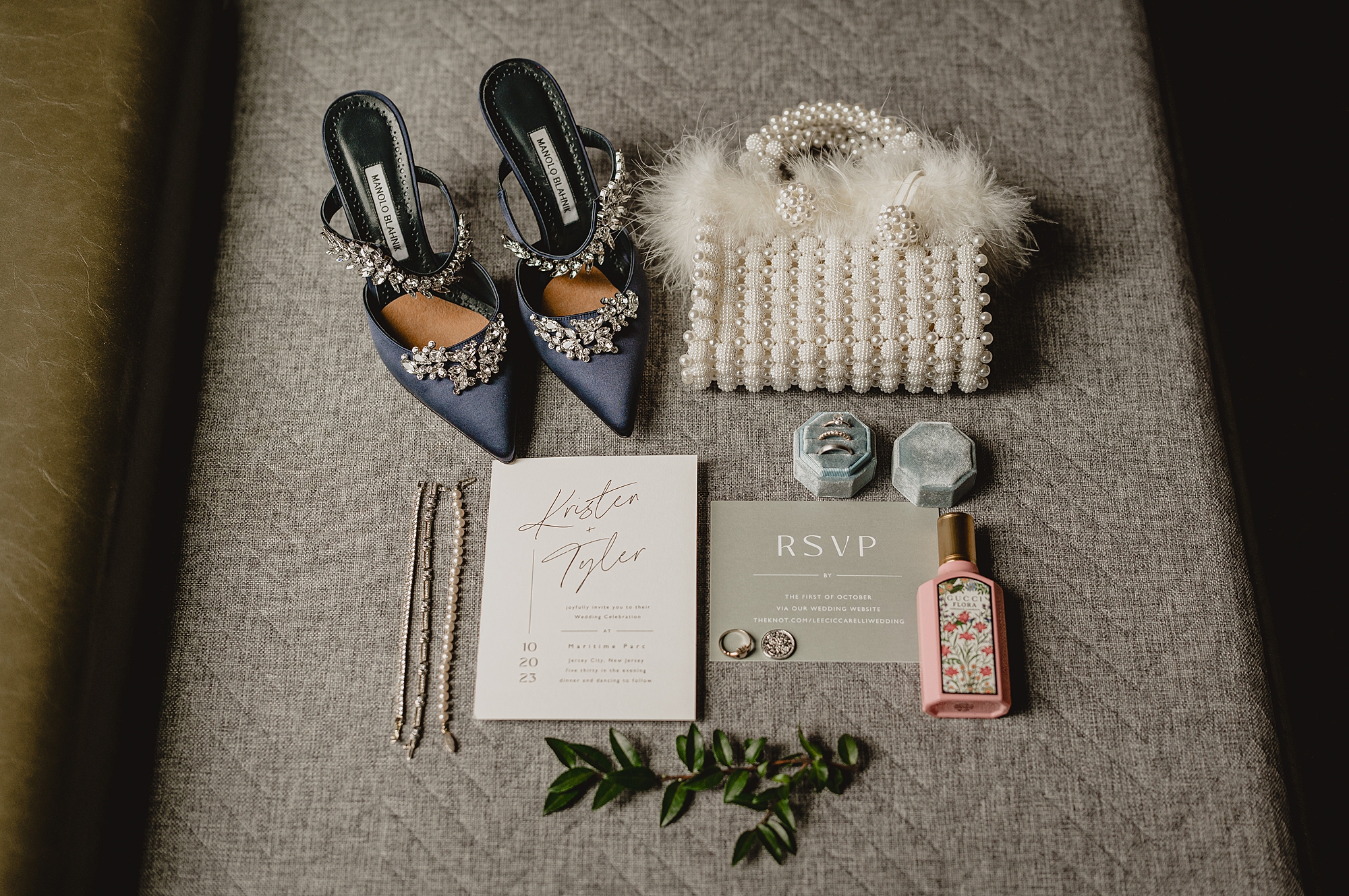 bride's blue shoes and pearl purse with feathers for wedding at Maritime Parc