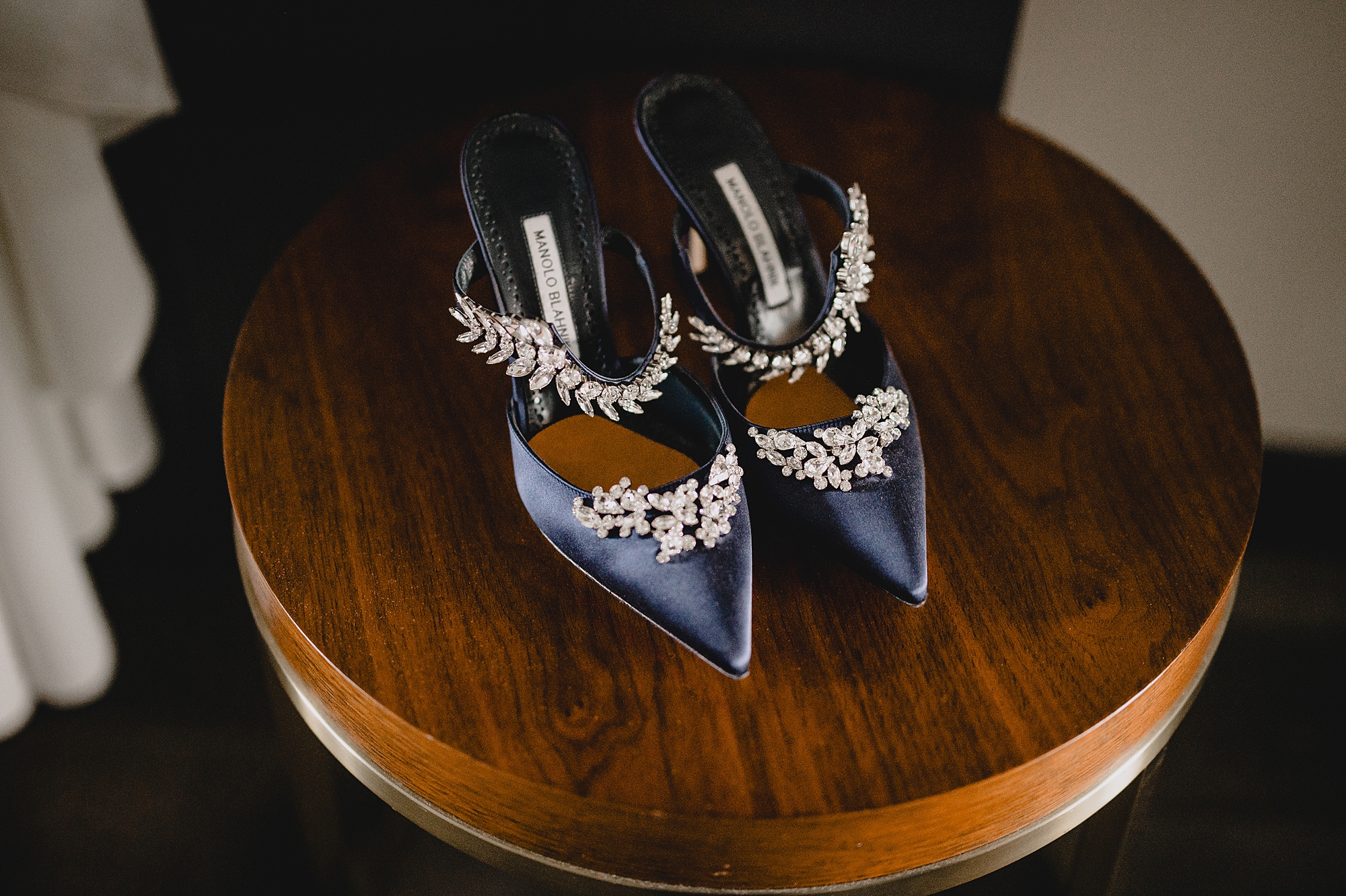 bride's navy blue shoes with diamond detailing