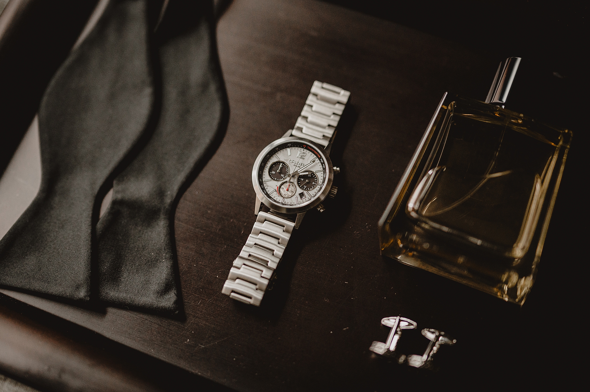 groom's silver watch with bowtie and cufflinks before Jersey City wedding day