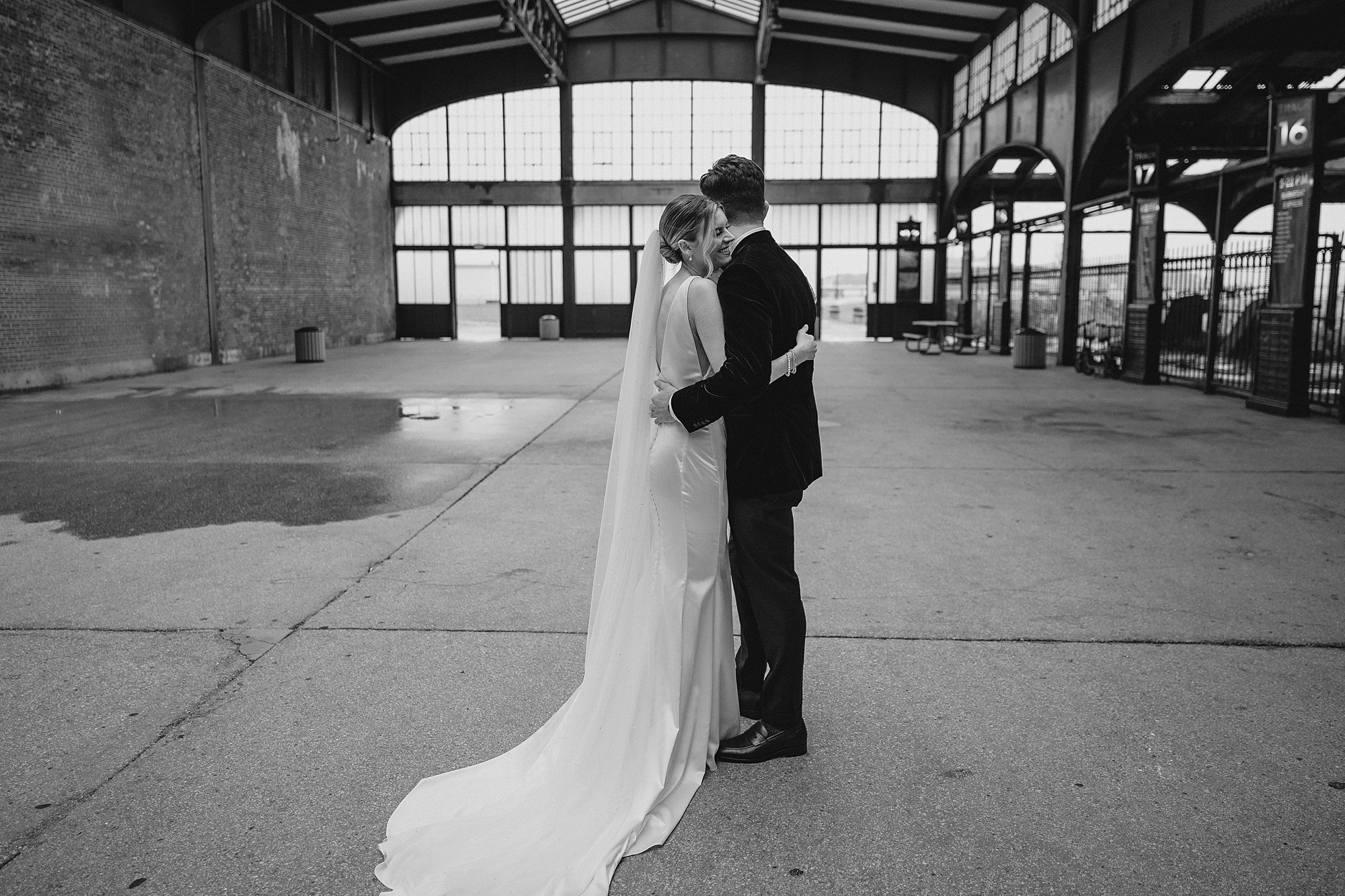 married couple hugs inside Maritime Parc