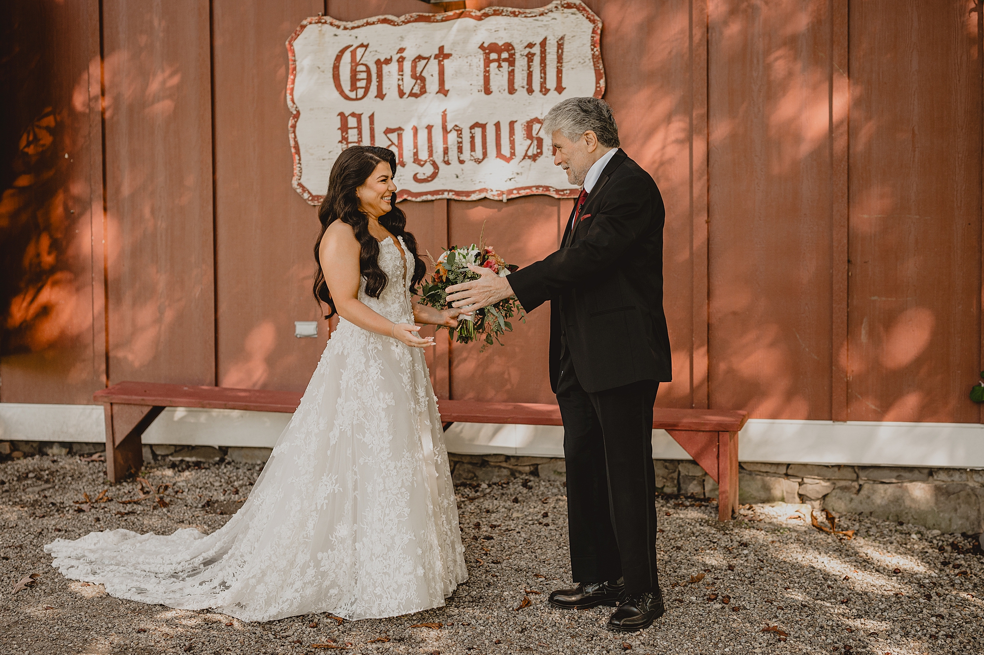 dad turns to see bride in front of Grist Mill for first look