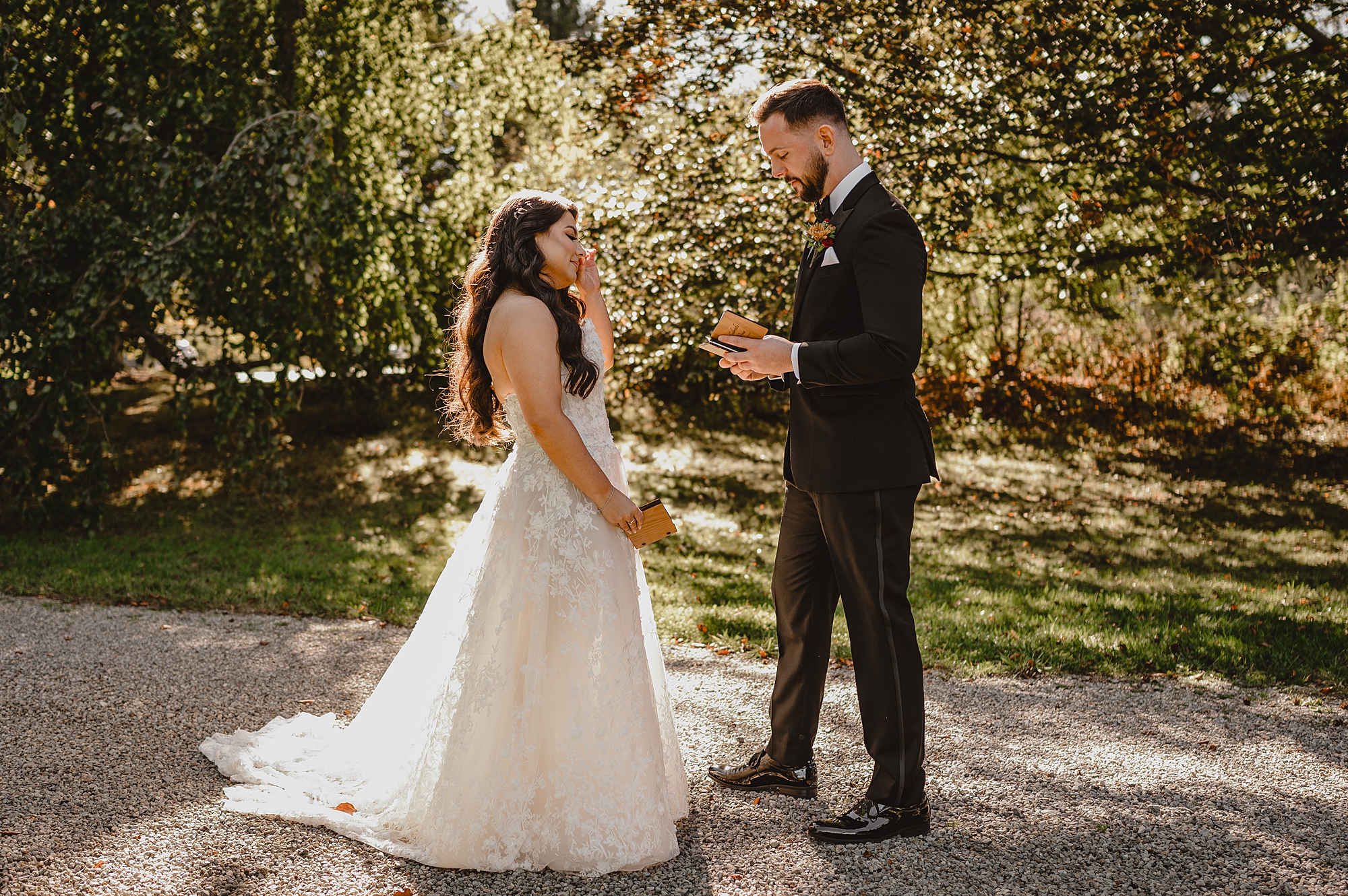 bride and groom react during first look at Crossed Keys Estate