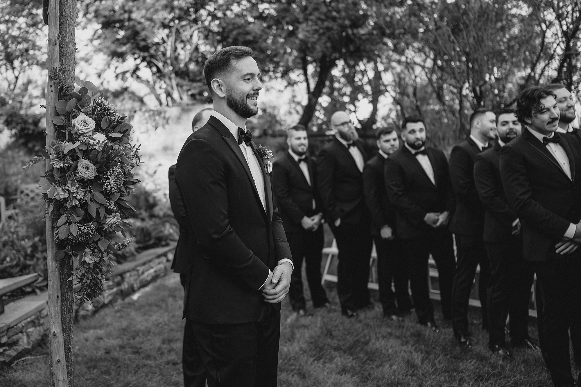 groom watches bride walk down aisle at Crossed Keys Estate