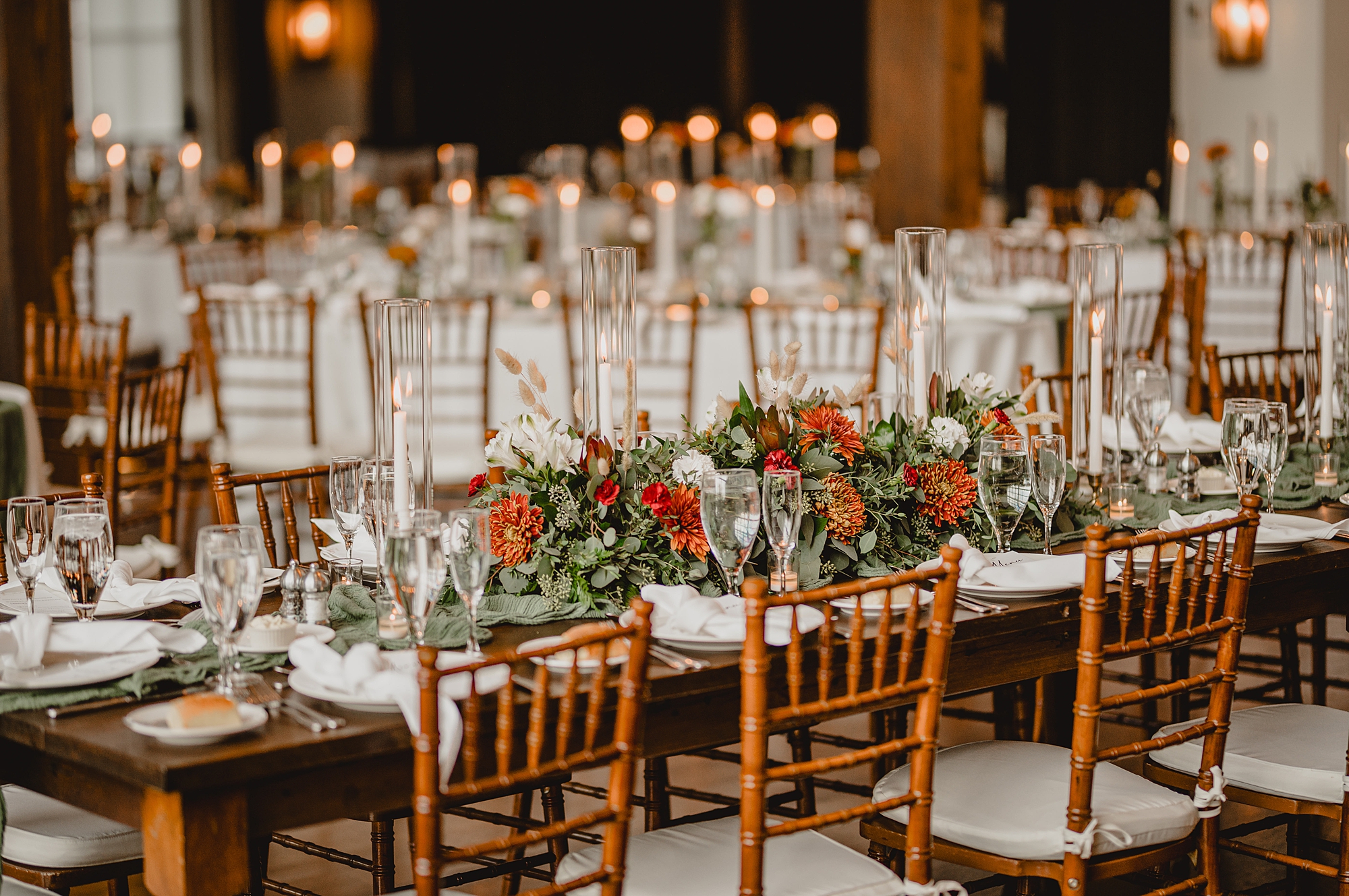 fall flowers sit in center of table at Crossed Keys Estate