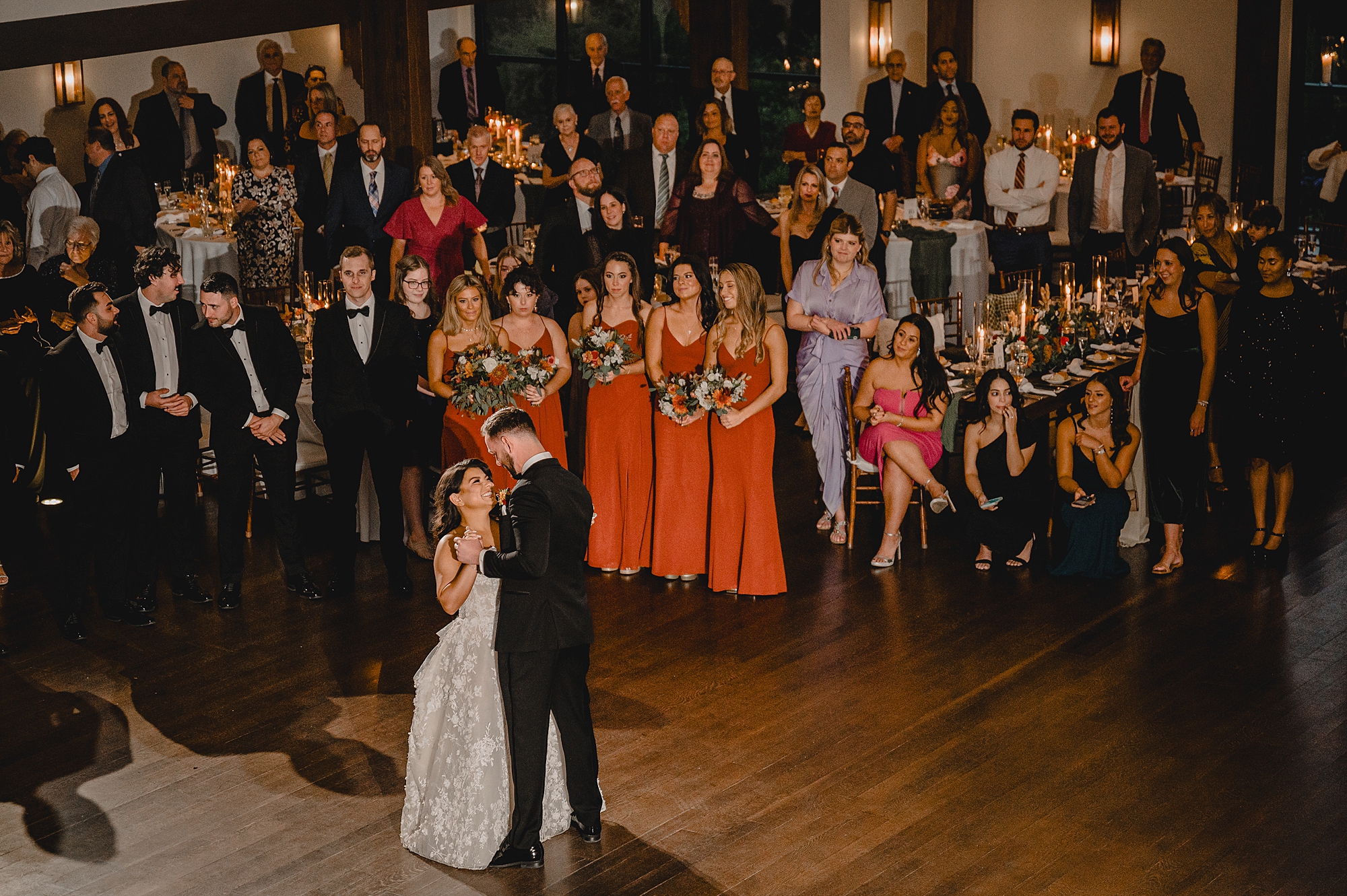 bride looks up at groom during first dance at Andover NJ wedding reception