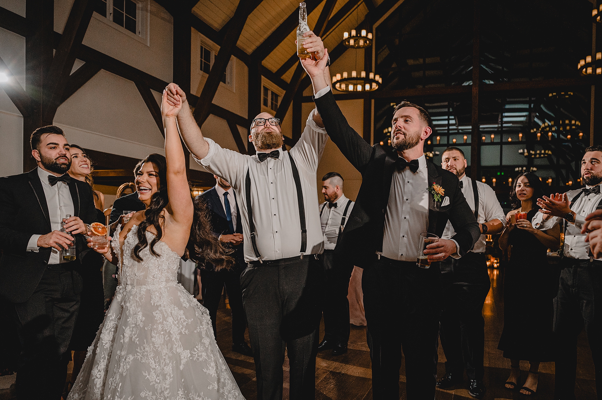 bride and groom dance with groomsman at Andover NJ wedding reception