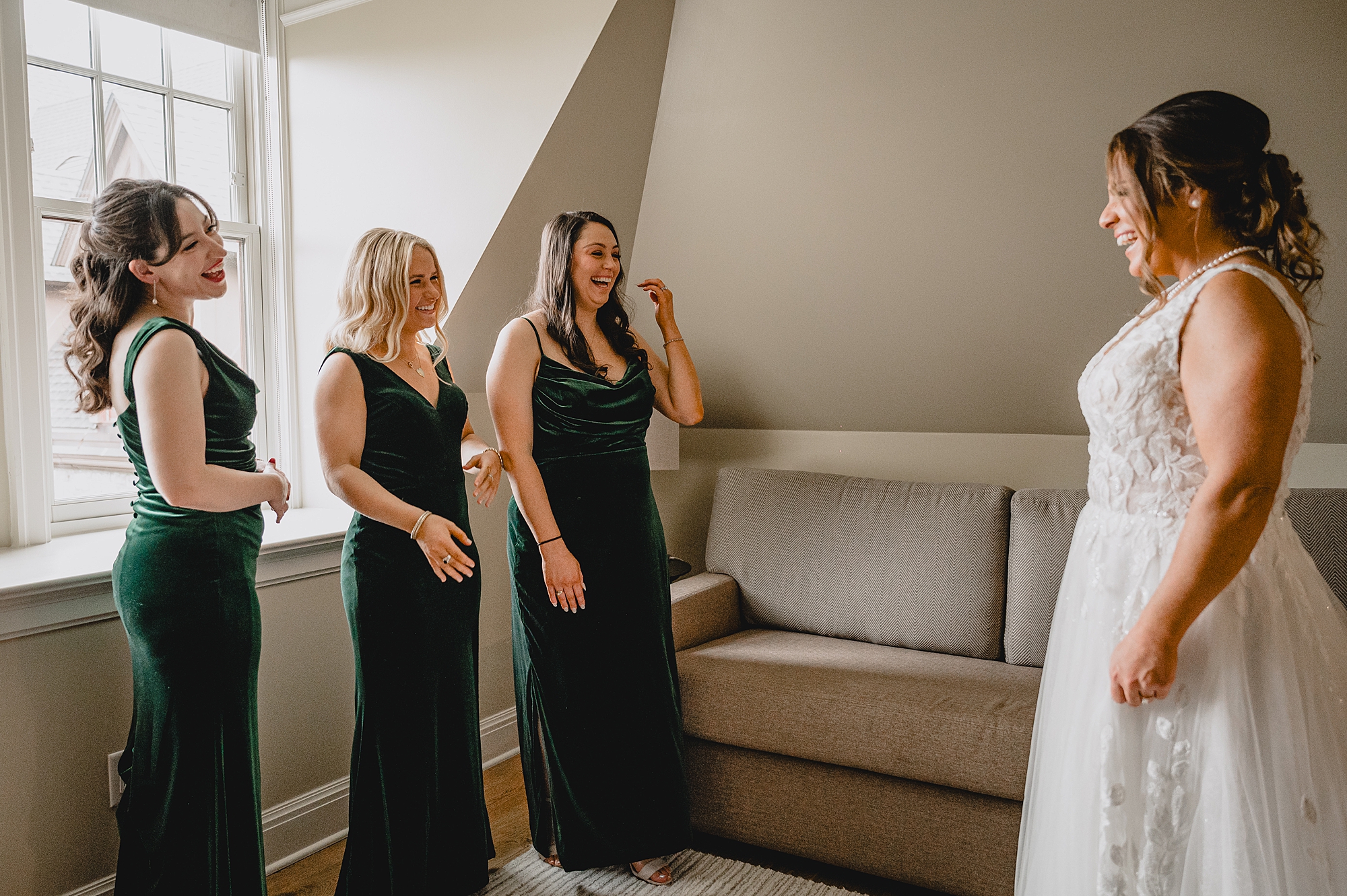 bridesmaids react to seeing bride in wedding dress