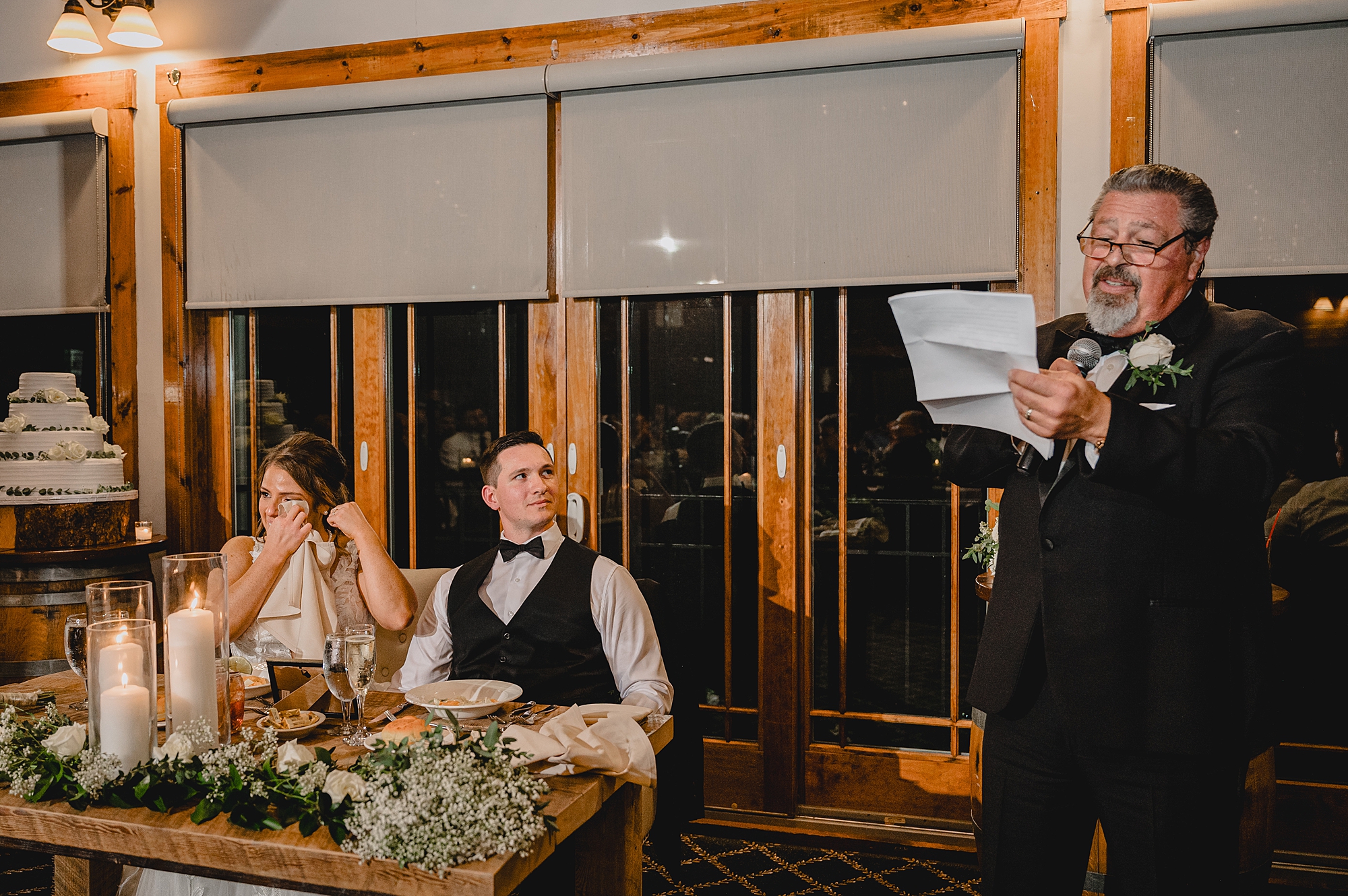 bride and groom listen to dad giving speech at Cortlandt, NY reception