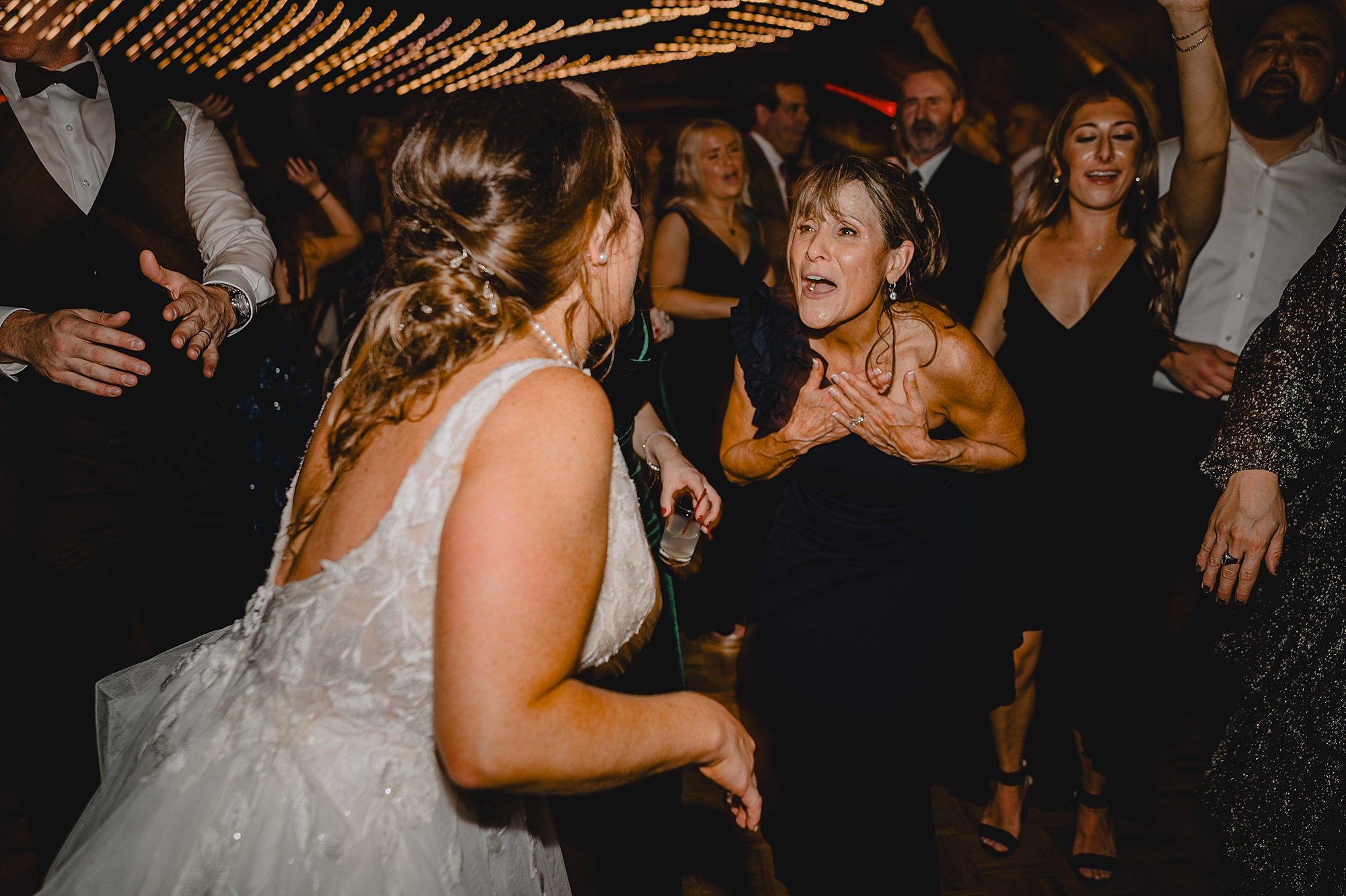 bride and guest dance during Cortlandt, NY reception