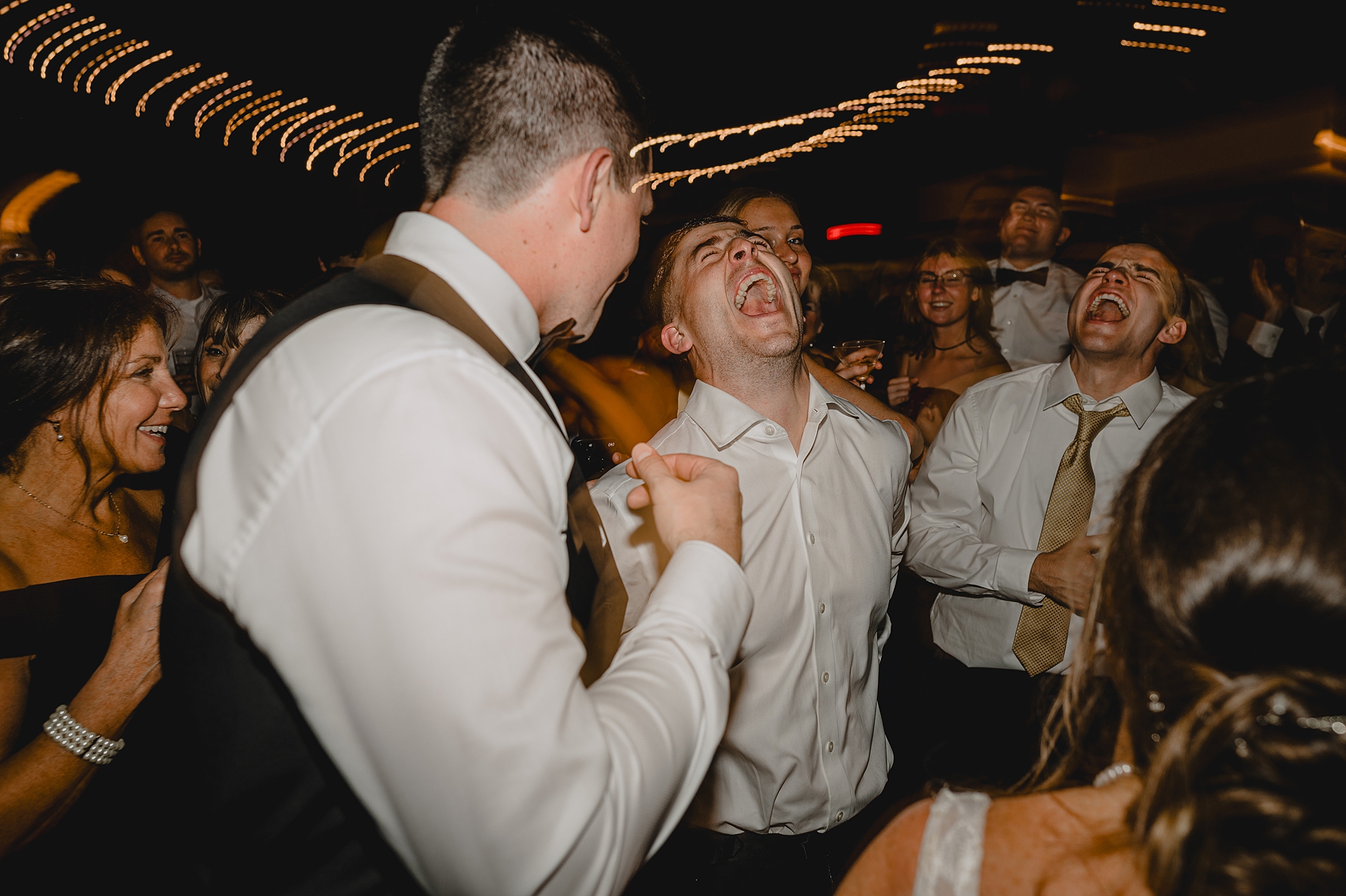 wedding guests dance during Cortlandt, NY reception