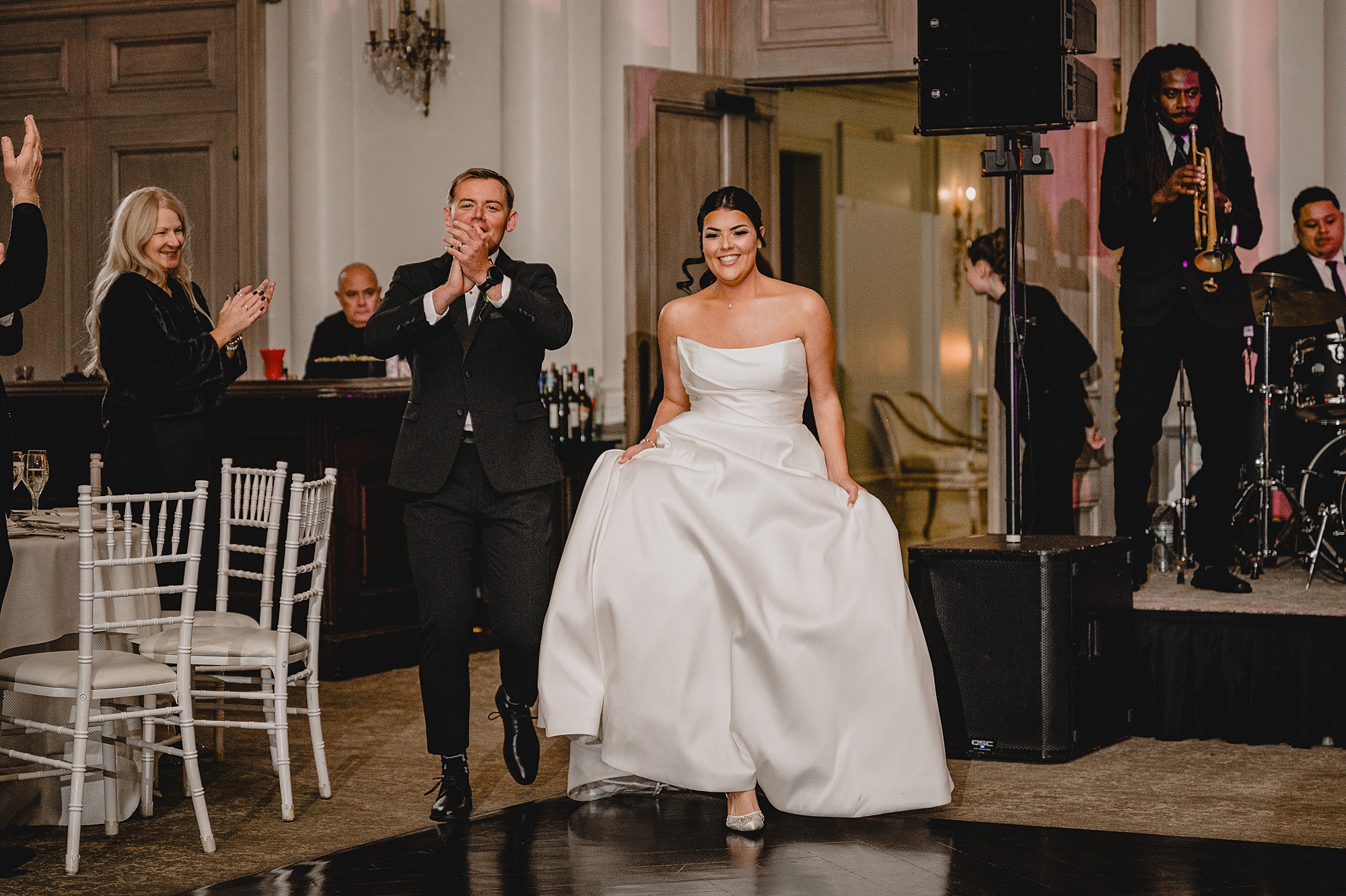 bride and groom walk into wedding reception at Park Chateau Estate