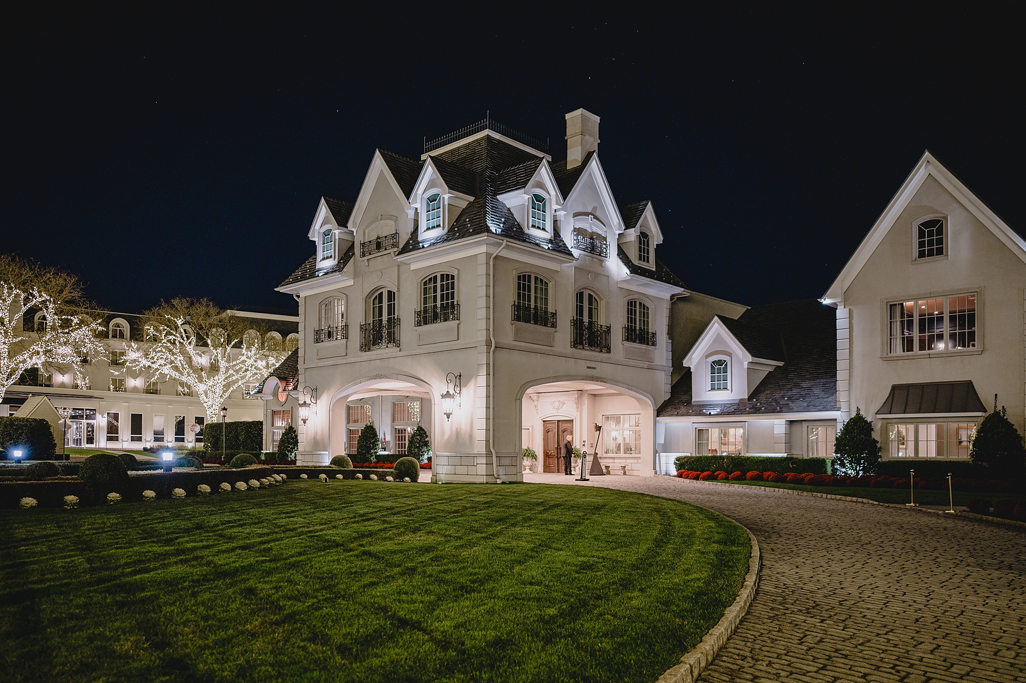 Park Chateau Estate lit up at night 