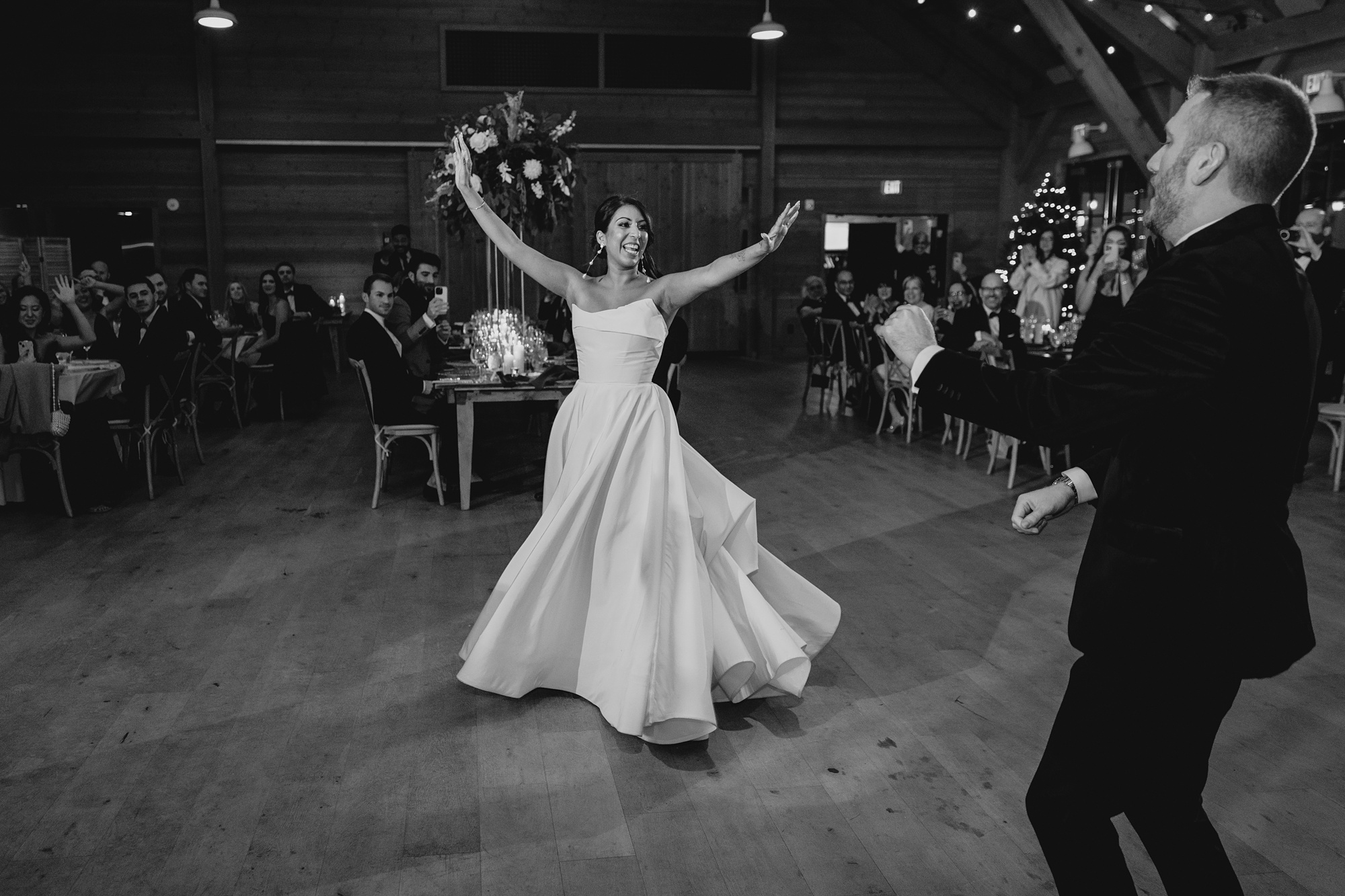 bride and groom dance together during reception in New Jersey 