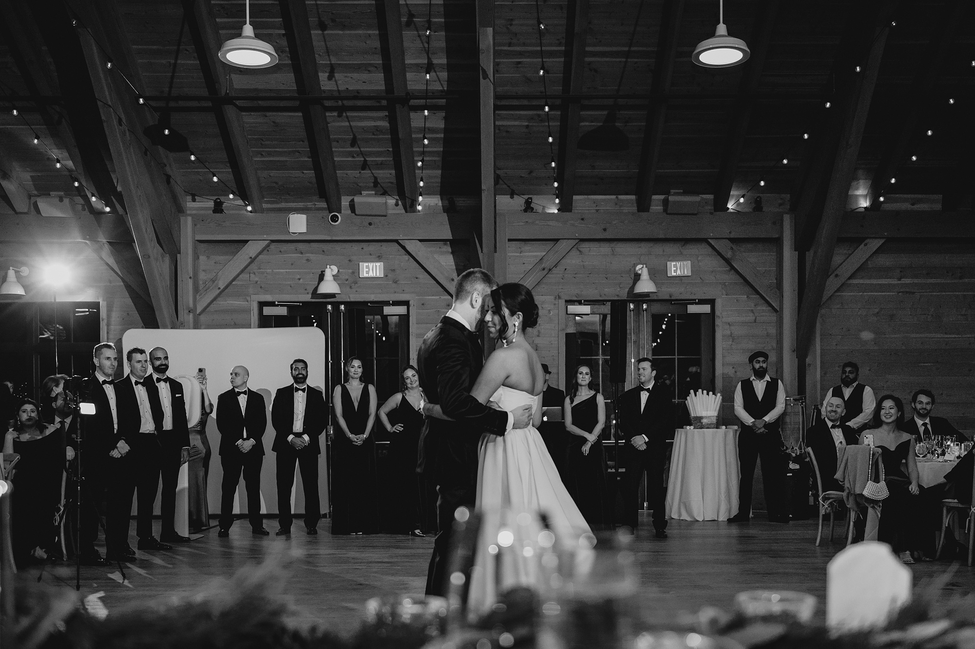 bride and groom dance together at the Lake House at Canandaigua