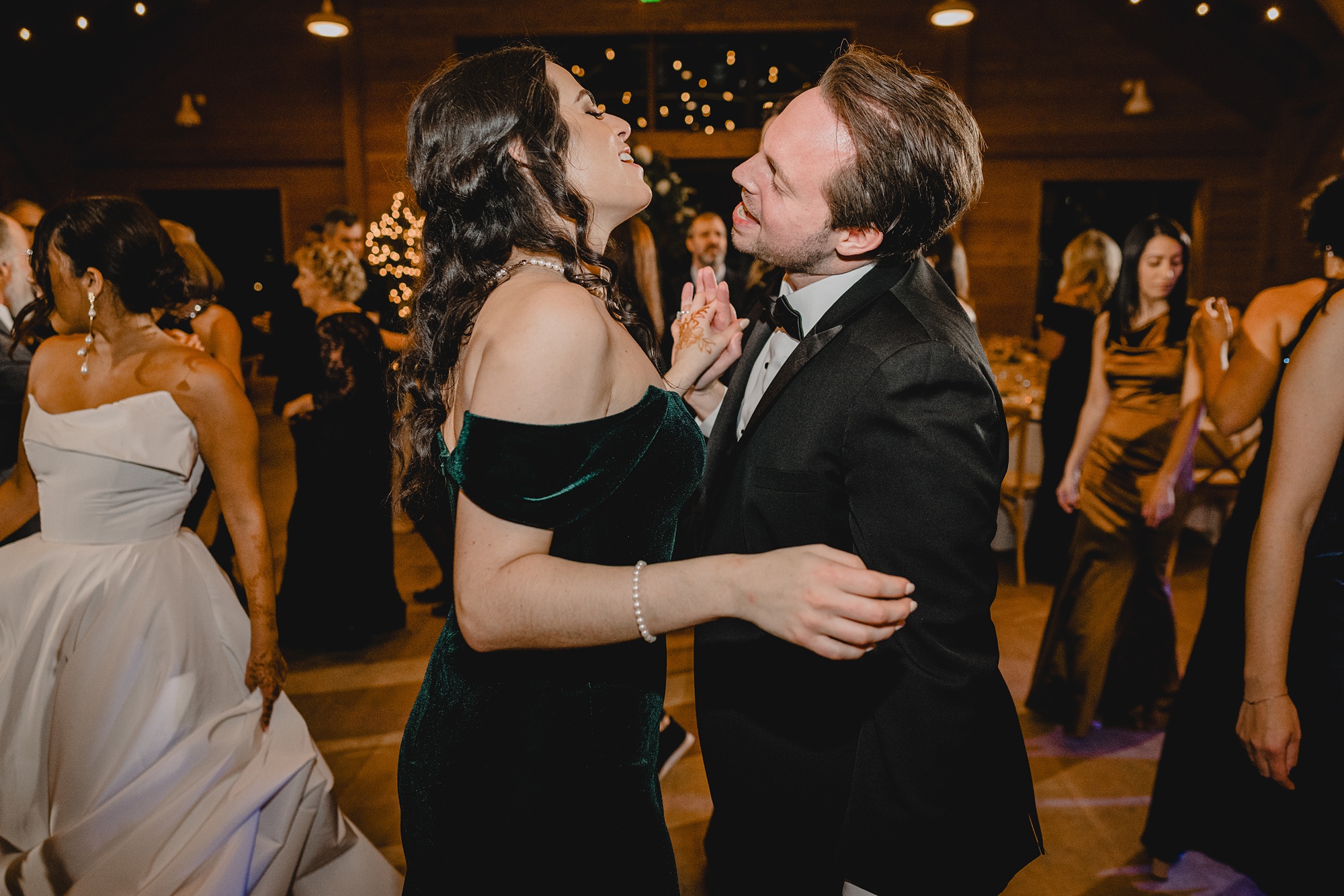 guests dance during winter wedding reception in New Jersey