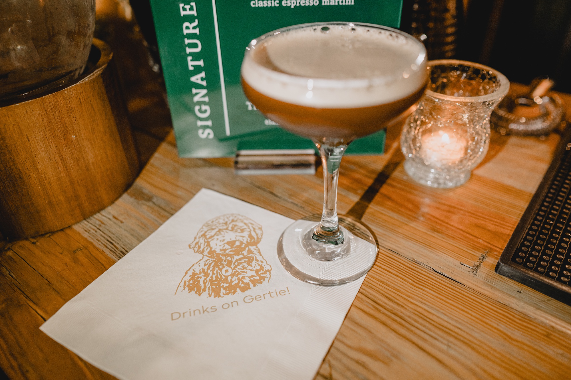 martini sits on custom napkins for winter wedding reception 