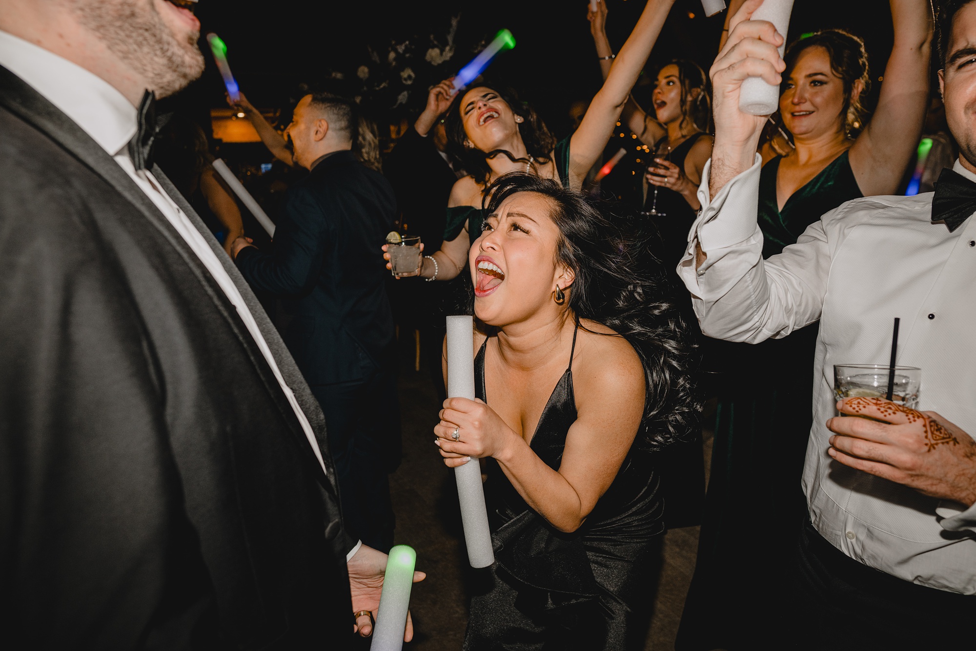 wedding guest dances during winter wedding reception in New Jersey