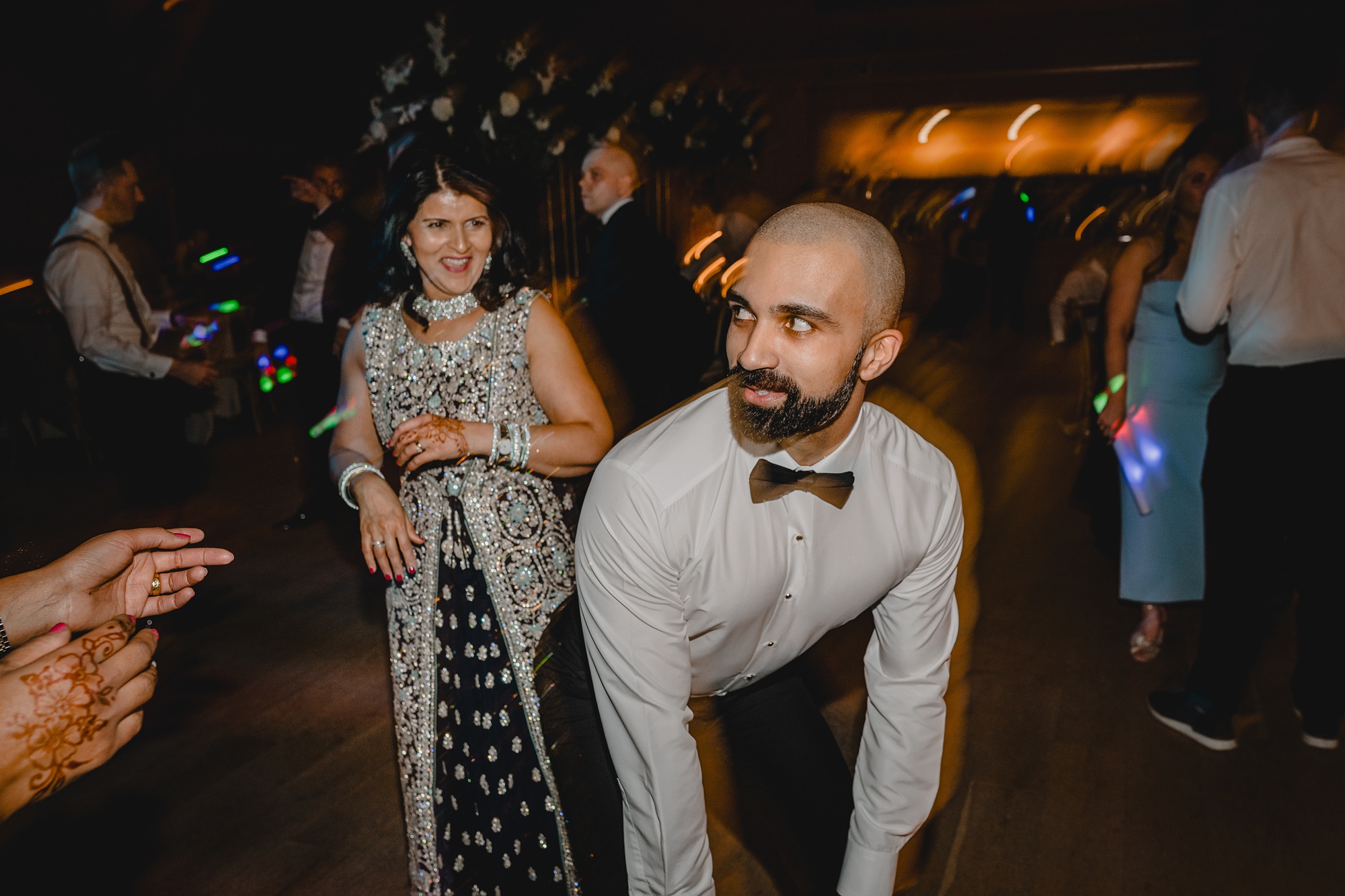 guests dance during winter wedding reception in New Jersey