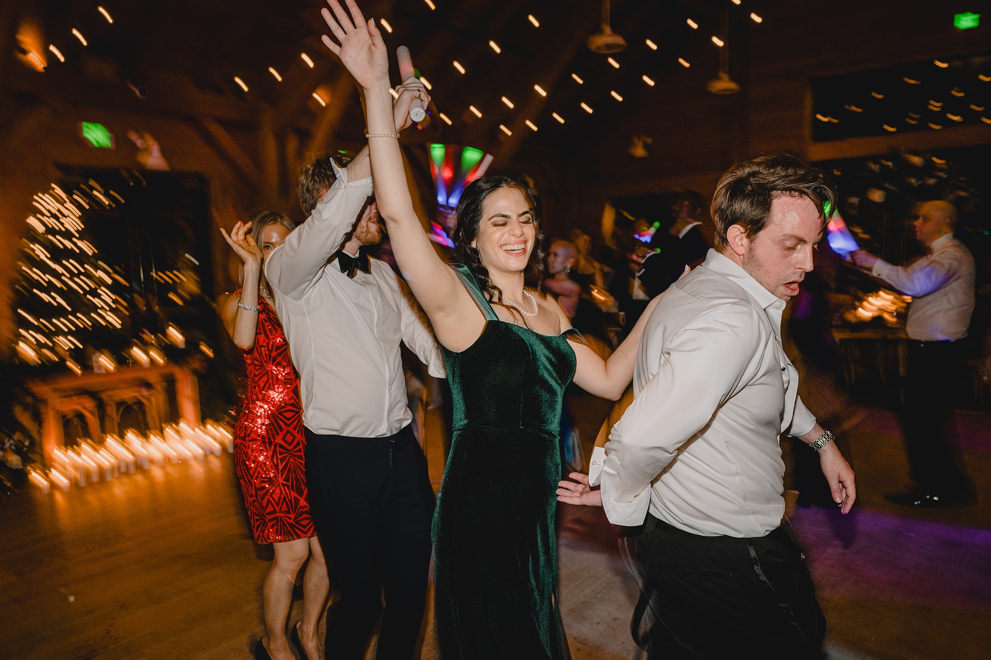 guests dance during winter wedding reception in New Jersey