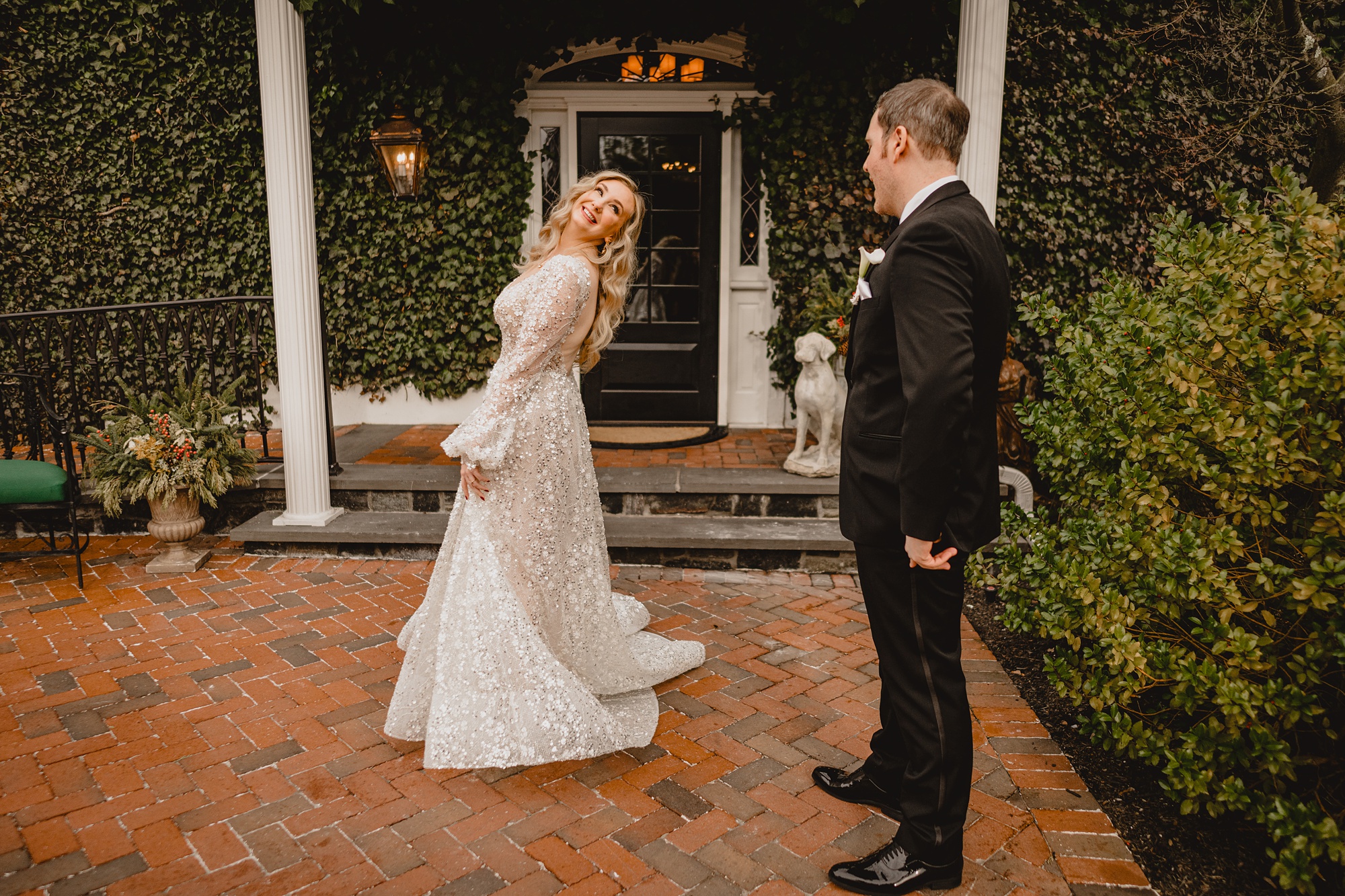 bride twirls around in long sleeve wedding gown at David's Country Inn