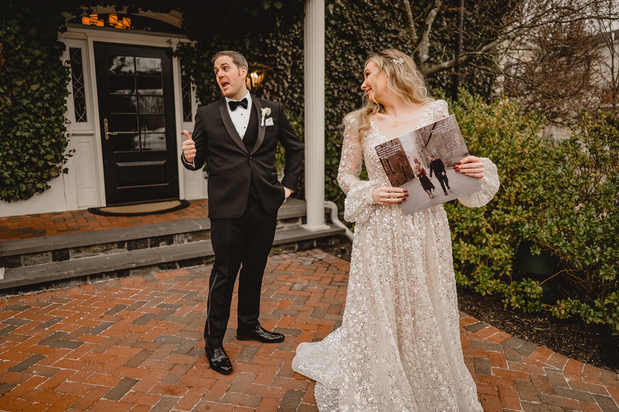 newlyweds laugh talking about record on patio at David's Country Inn