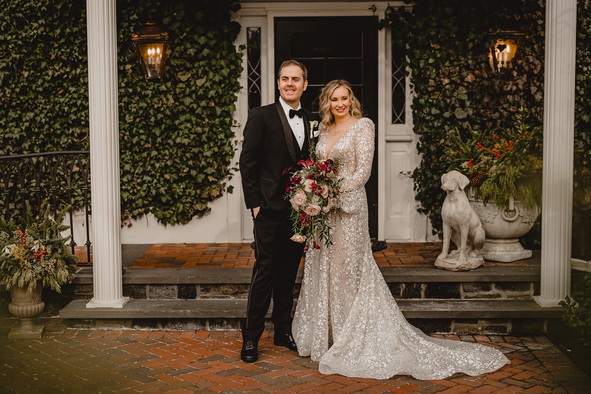 bride and groom stand together during winter wedding at David's Country Inn