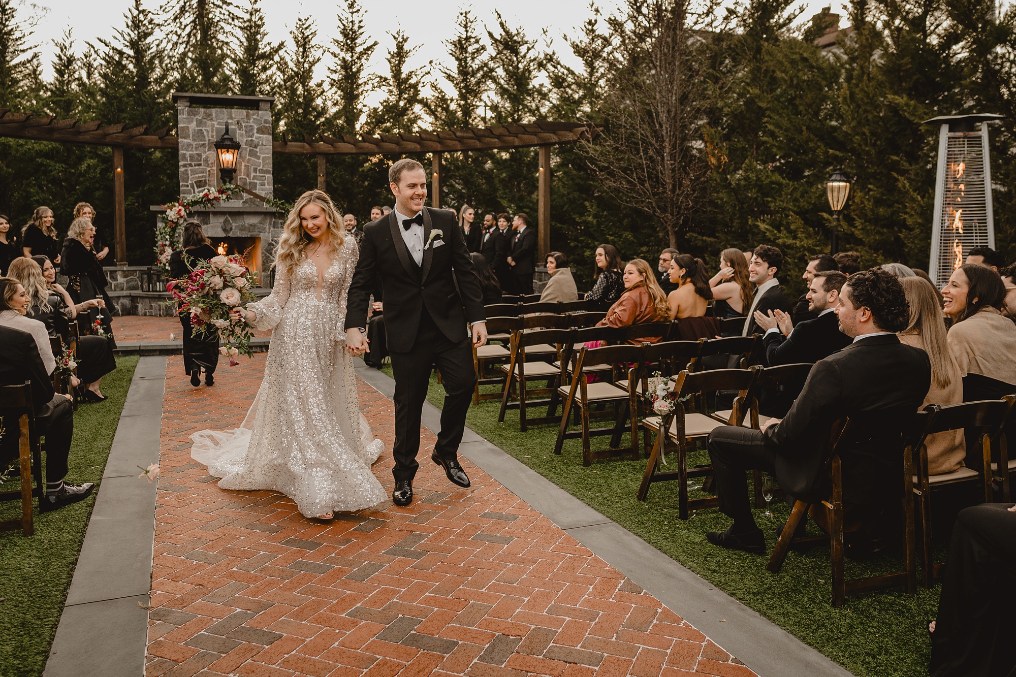 bride and groom walk up aisle at David's Country Inn
