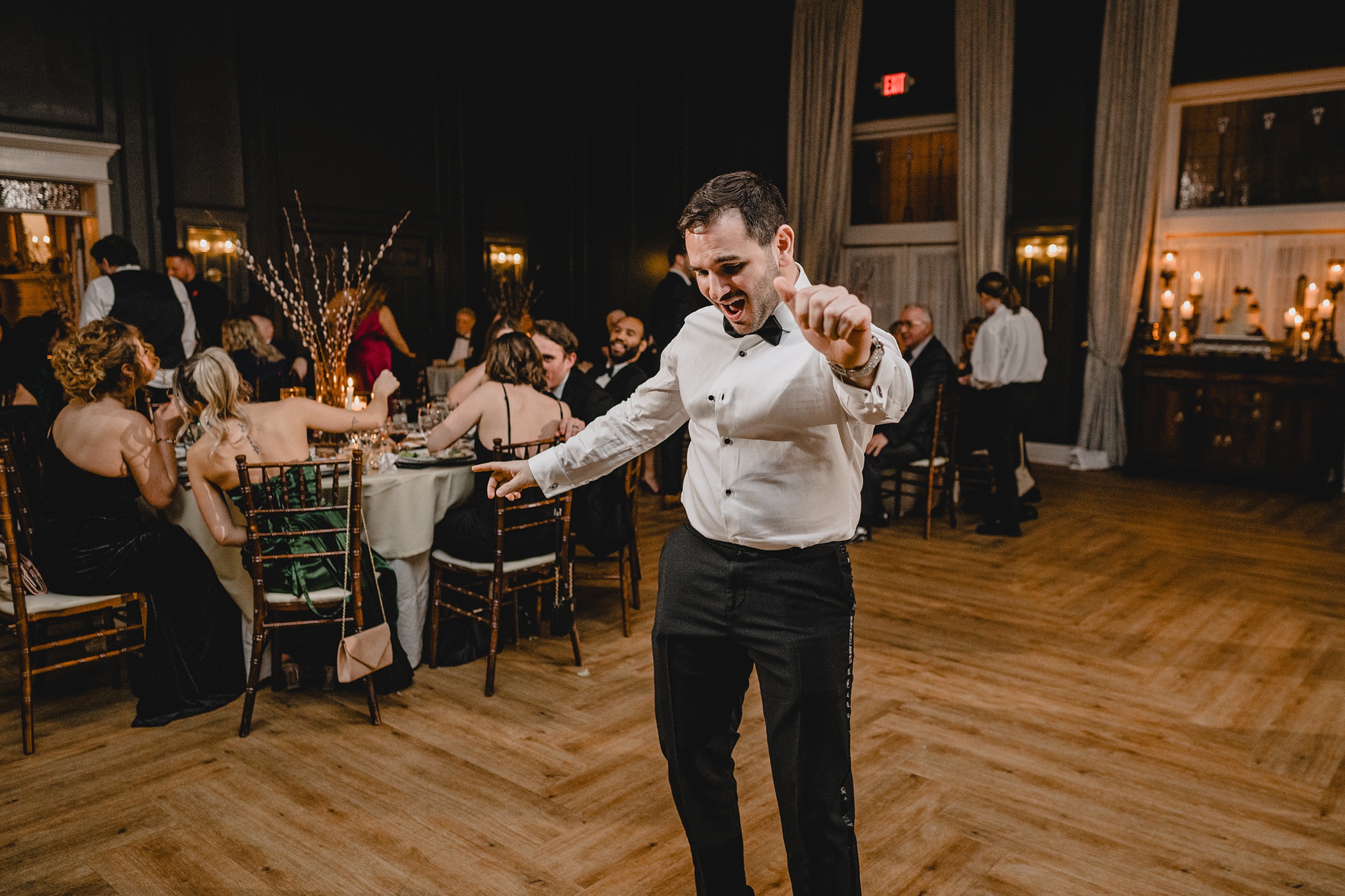 groomsman dances during NJ wedding reception