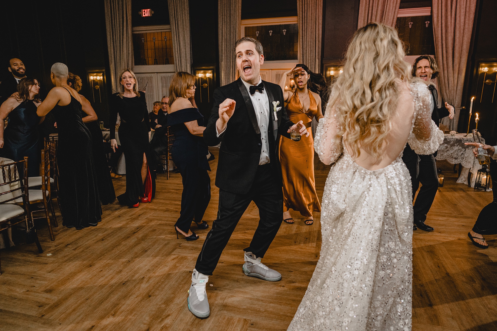 groom dances during NJ wedding reception