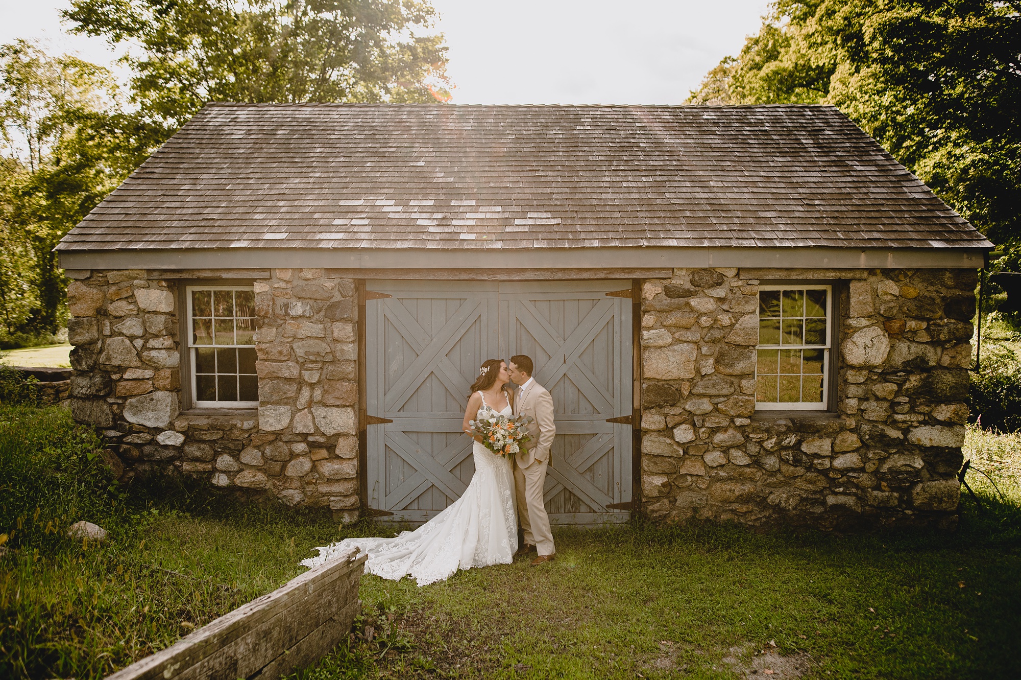 inspiration for wedding photos in front of blue barn door at Waterloo Village