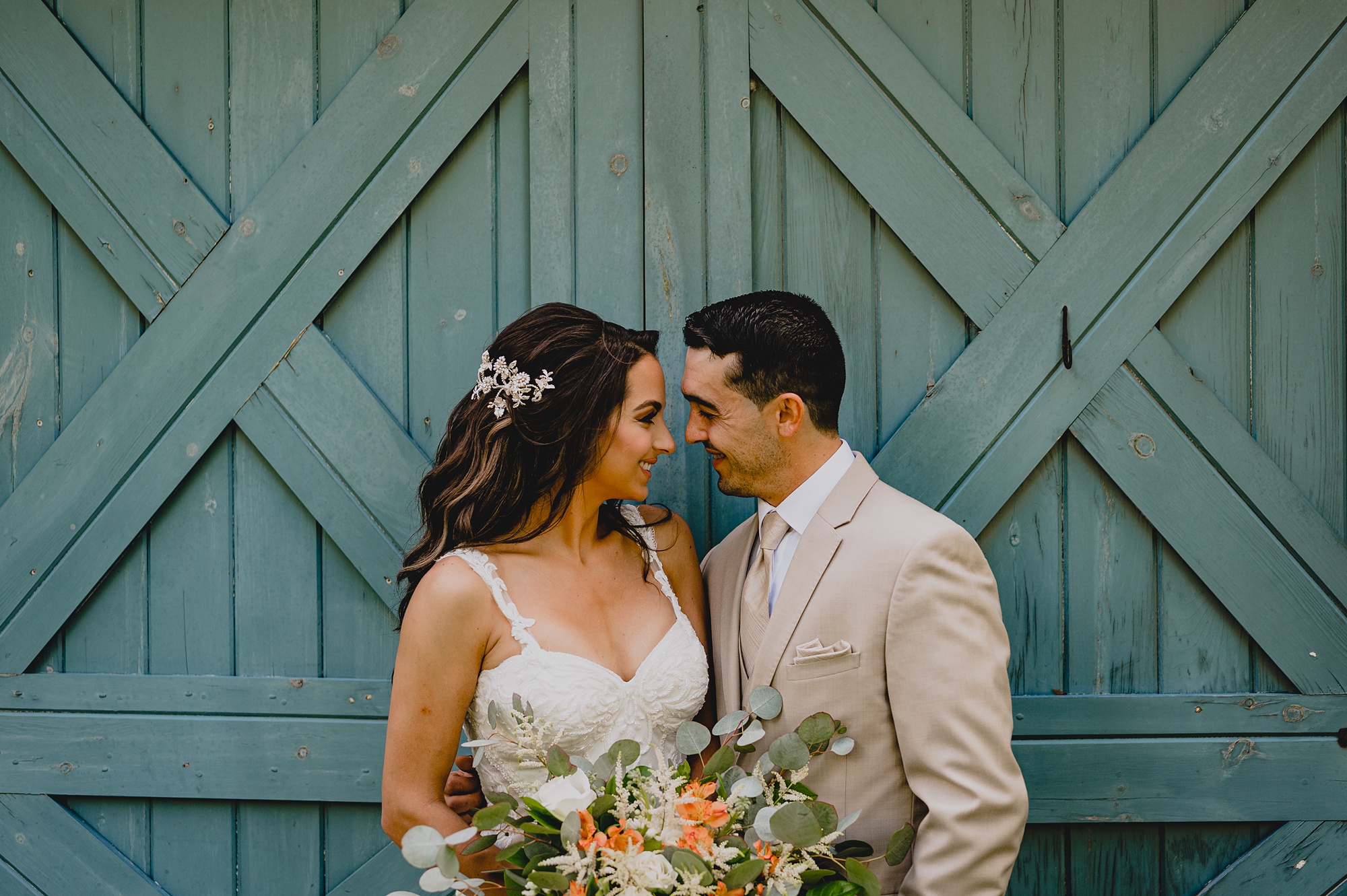 husband and wife hug during Waterloo Village wedding day