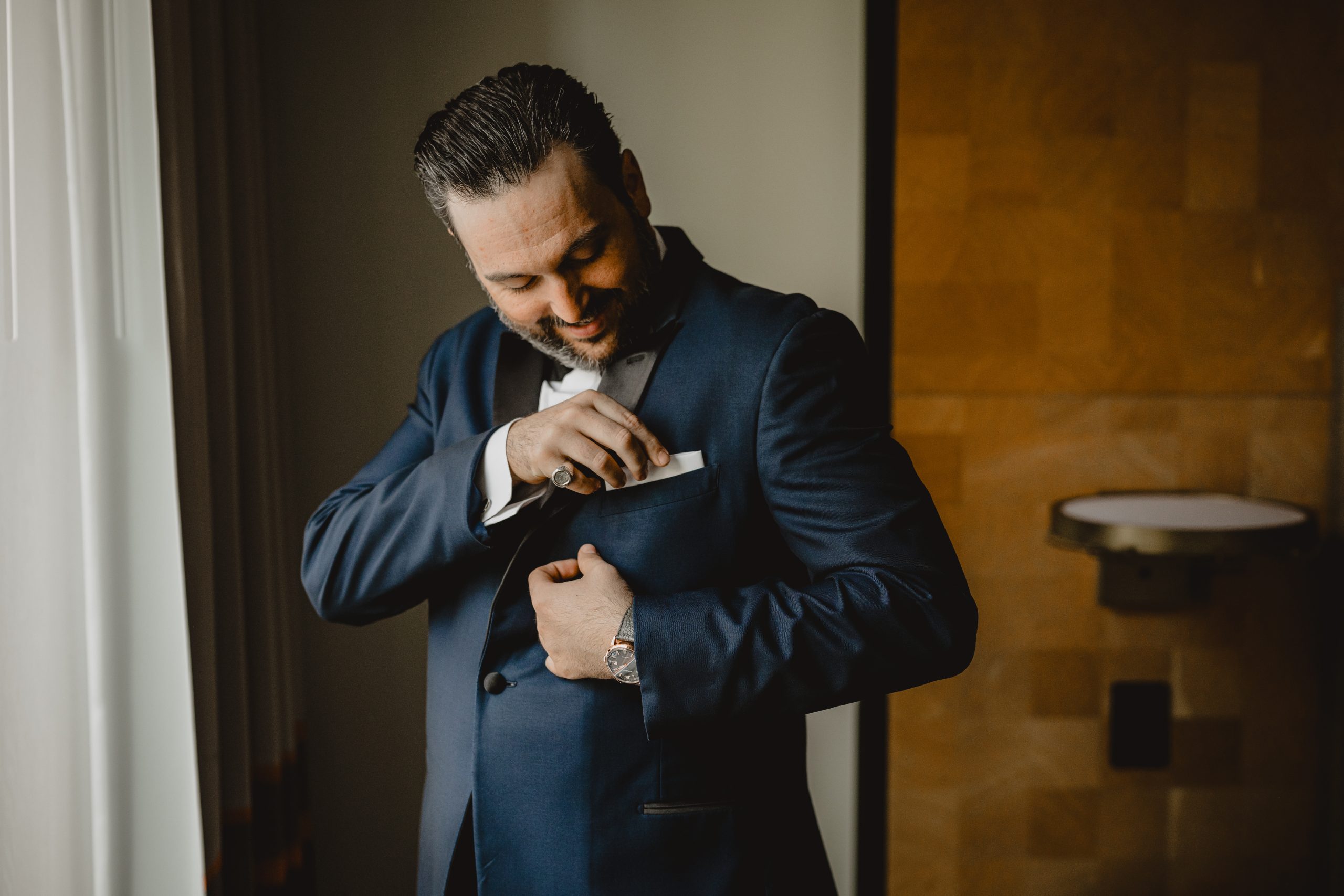 Groom getting ready before a wedding at Maritime Parc.
