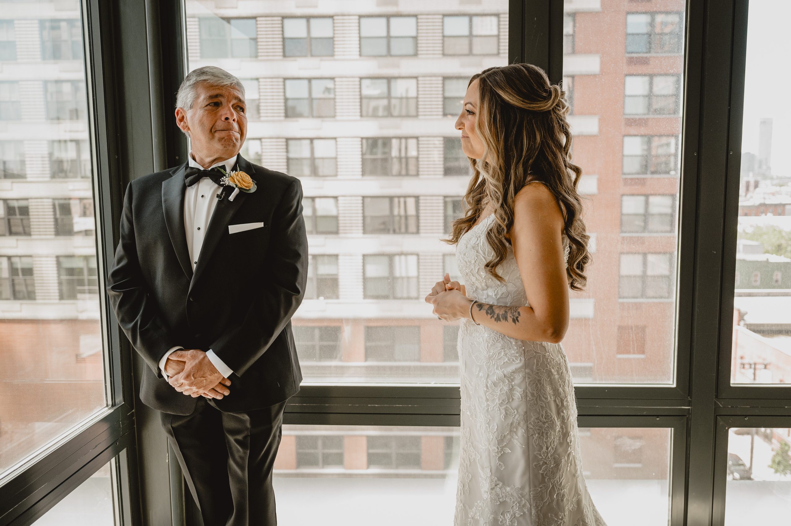 Bride's first look with her father before her wedding at Maritime Parc.