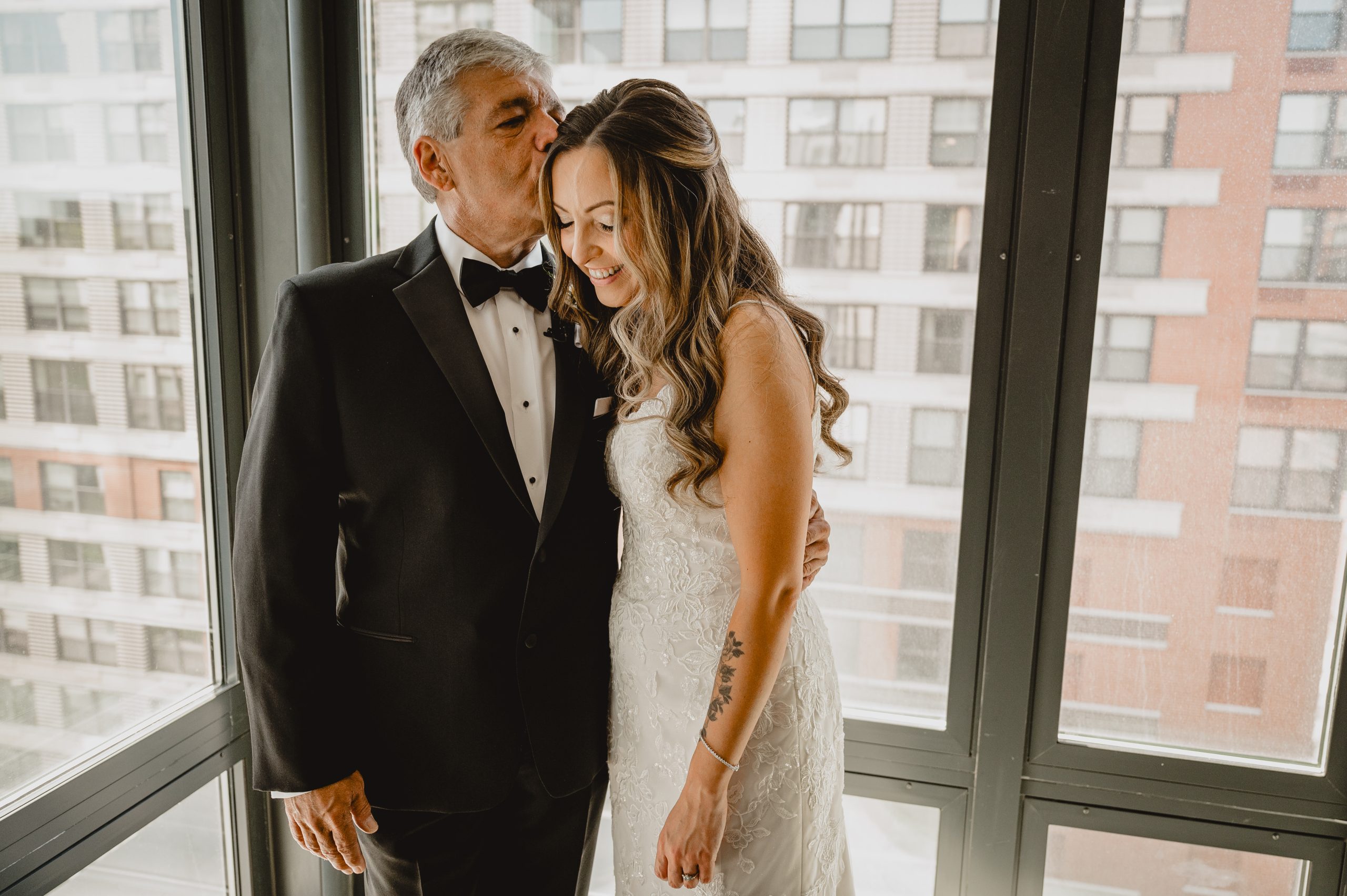 Bride's first look with her father before her wedding at Maritime Parc.