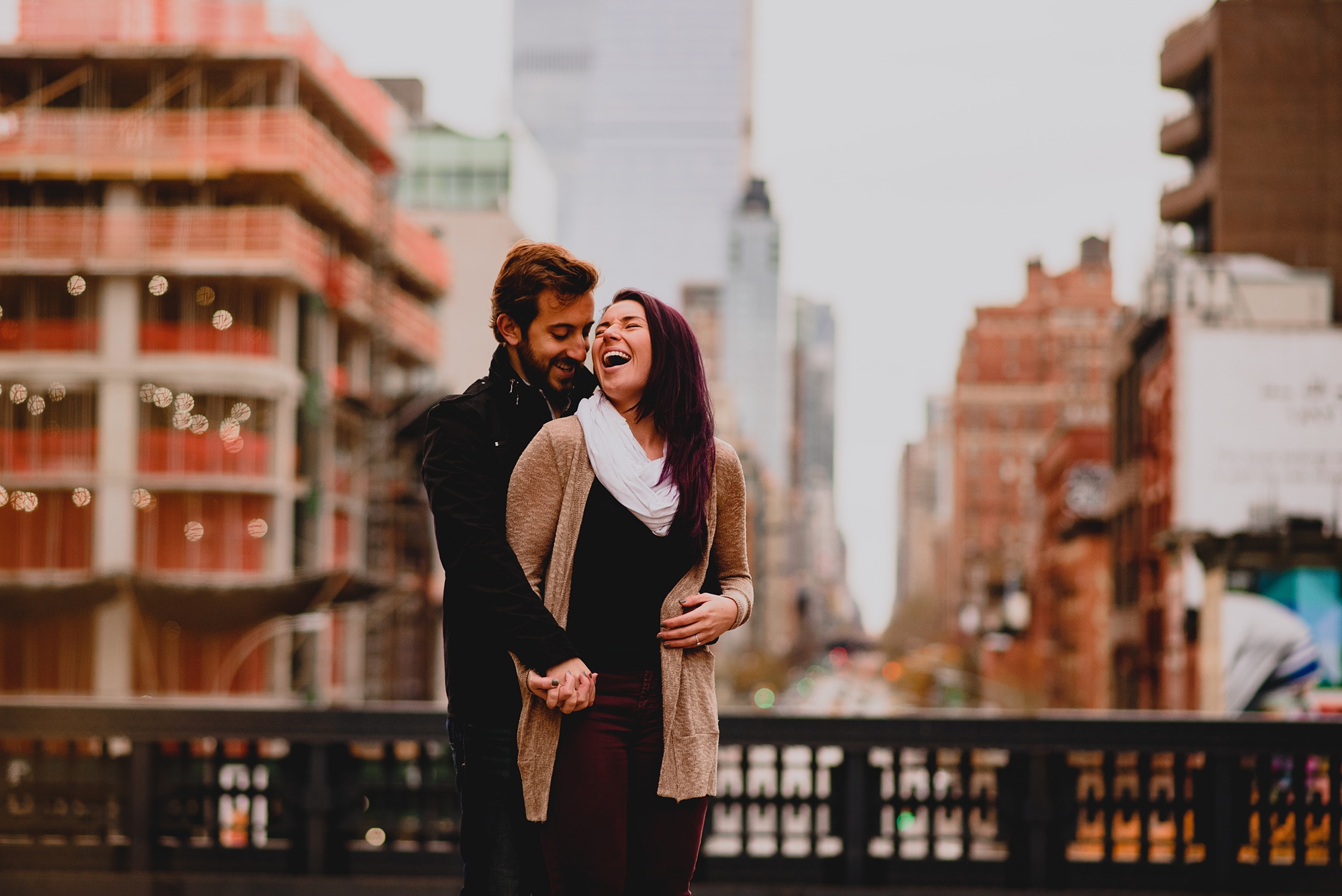 man hugs woman making her laugh at the High Line