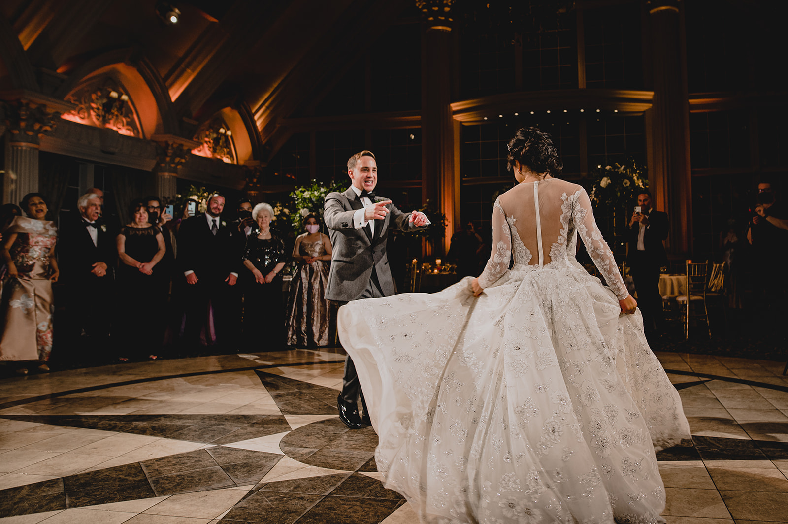 bride and groom dance in ballroom of Ashford Estate