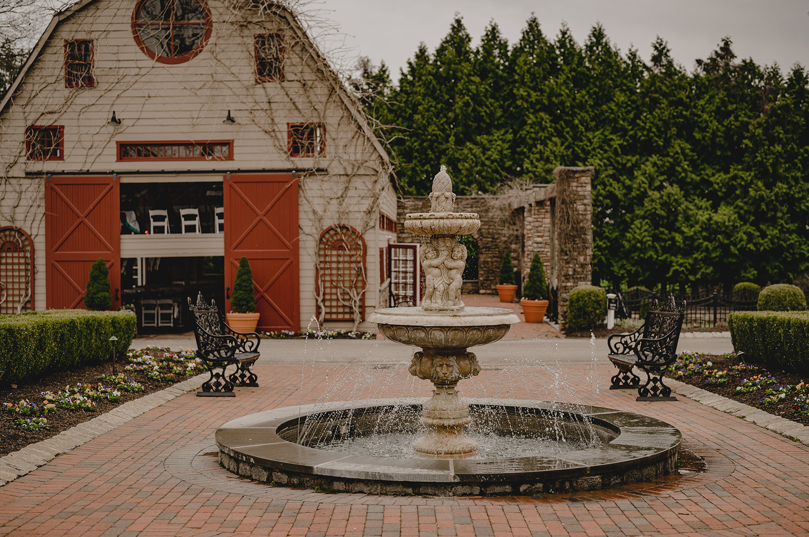 view outside barn at Ashford Estate with fountain 