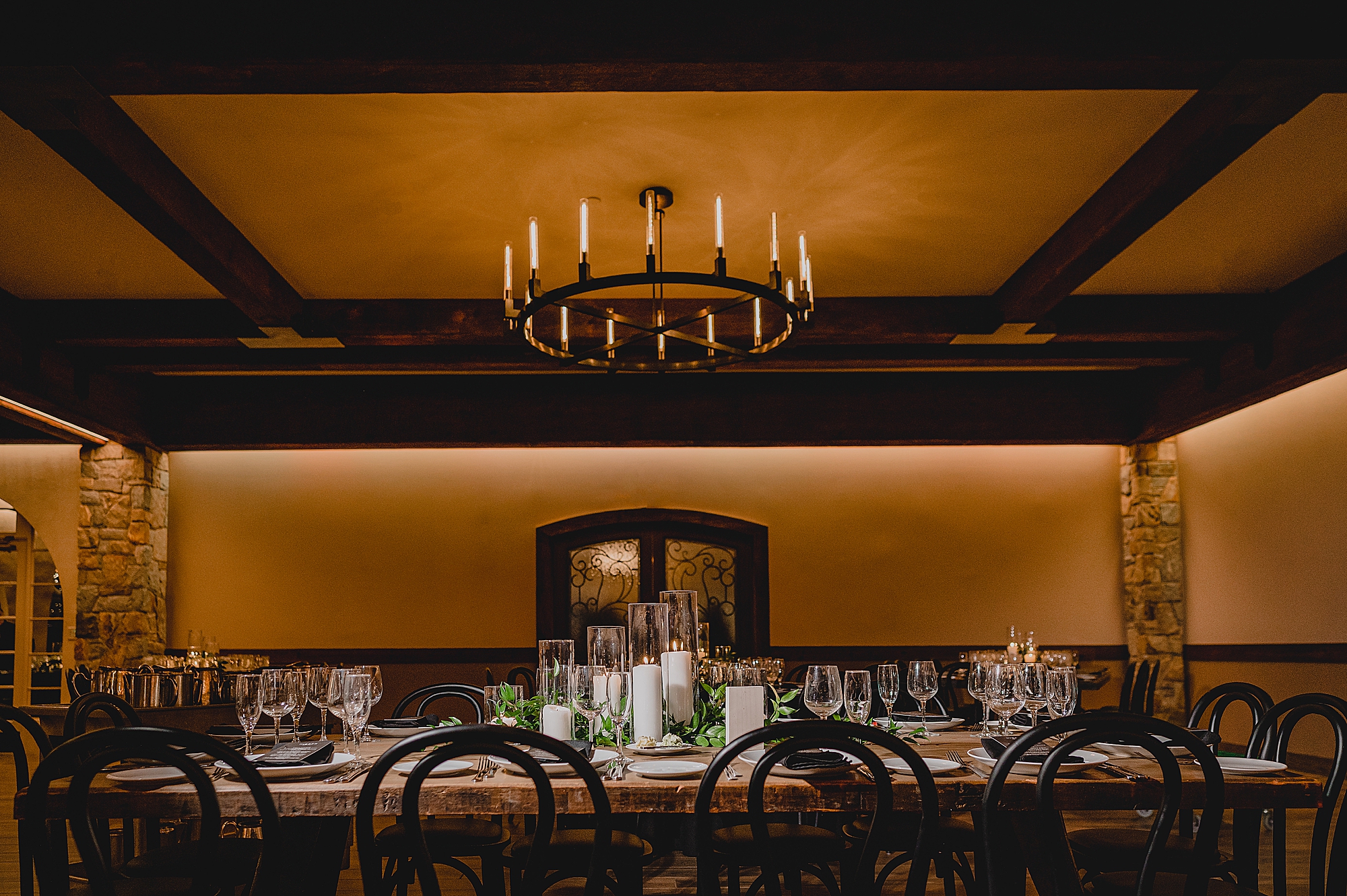 wedding reception with food on wooden table at the Reserve at Perona Farms