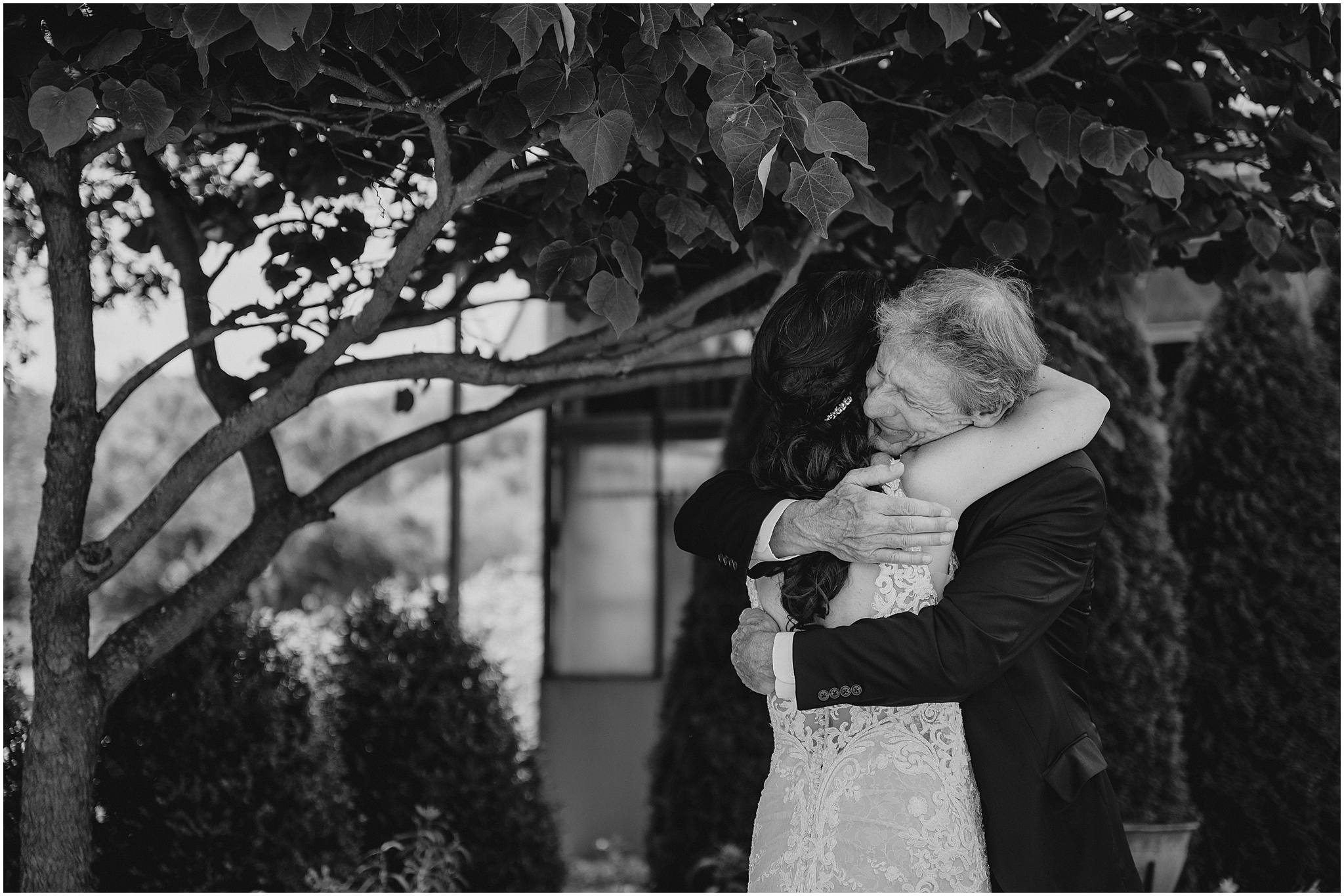 bride hugs father during first look at the Conservatory in New Jersey
