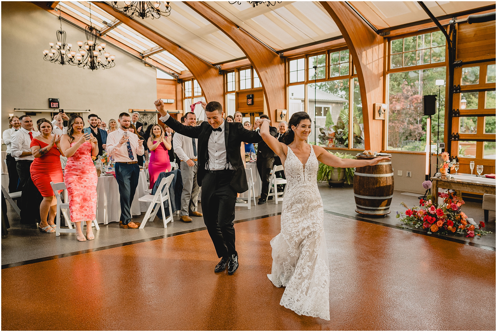 newlyweds dance onto floor during reception at the Conservatory at Sussex County Fairgrounds
