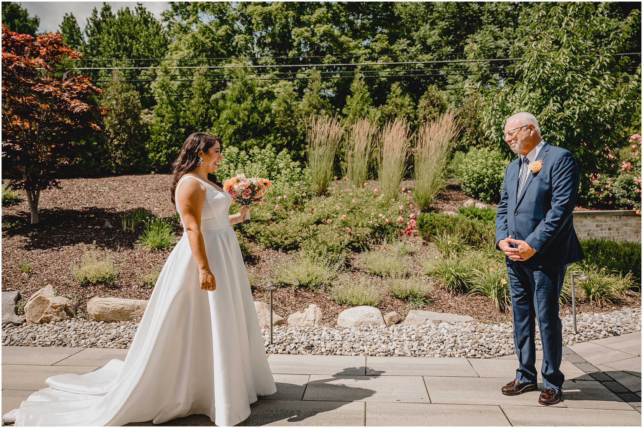bride approaches dad for first look in garden at the Perona Farms Refinery