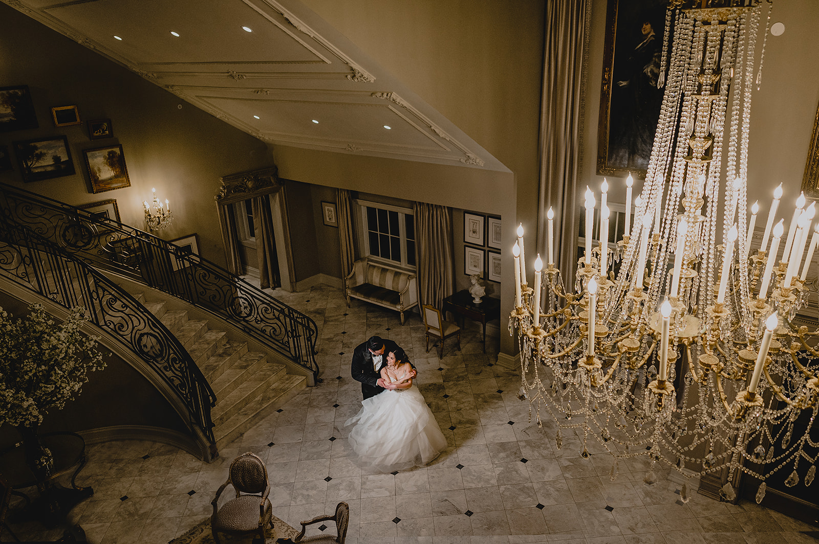 newlyweds twirl on dance floor at Park Chateau Estate