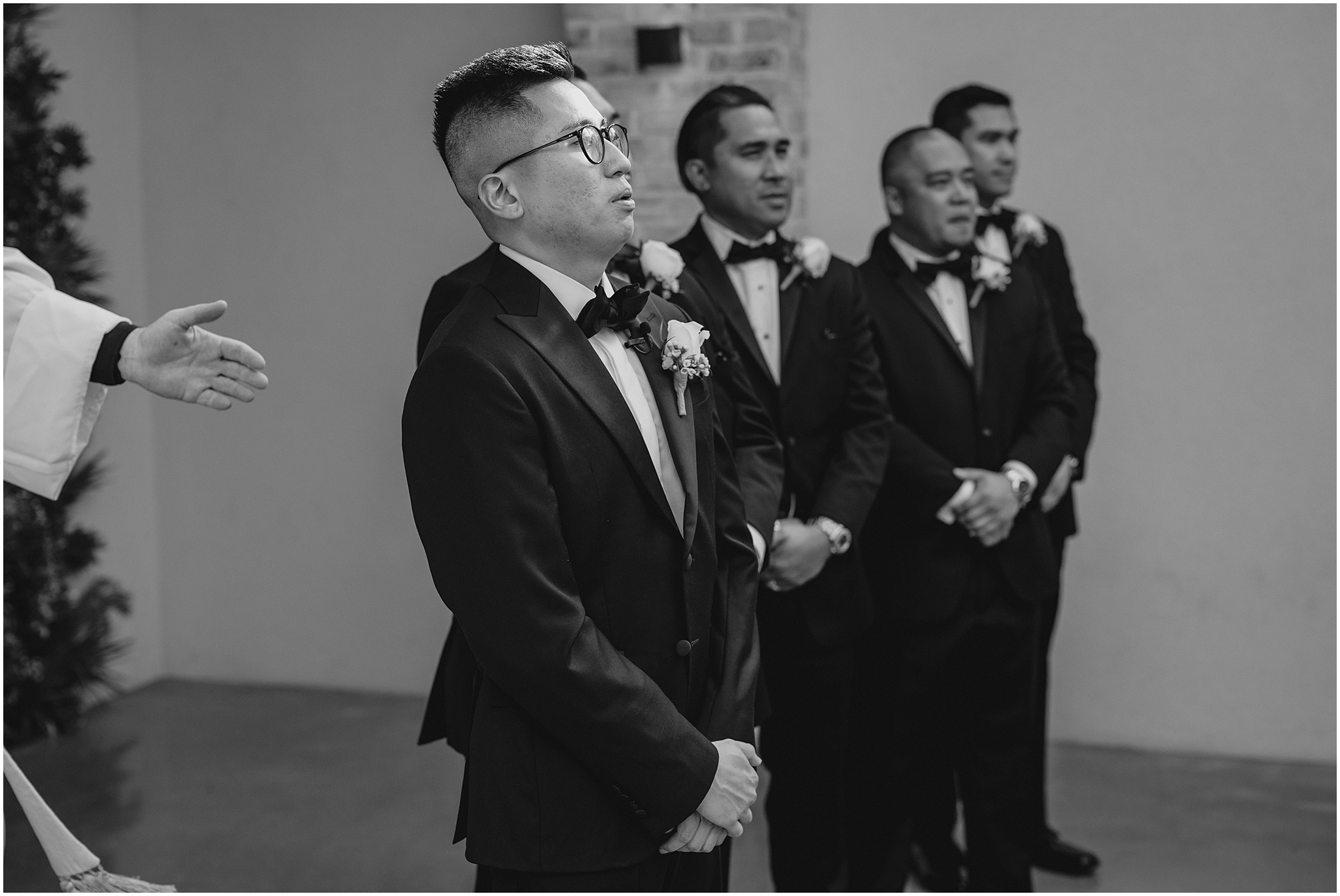 groom breathes out watching bride walk down aisle during NJ wedding ceremony 