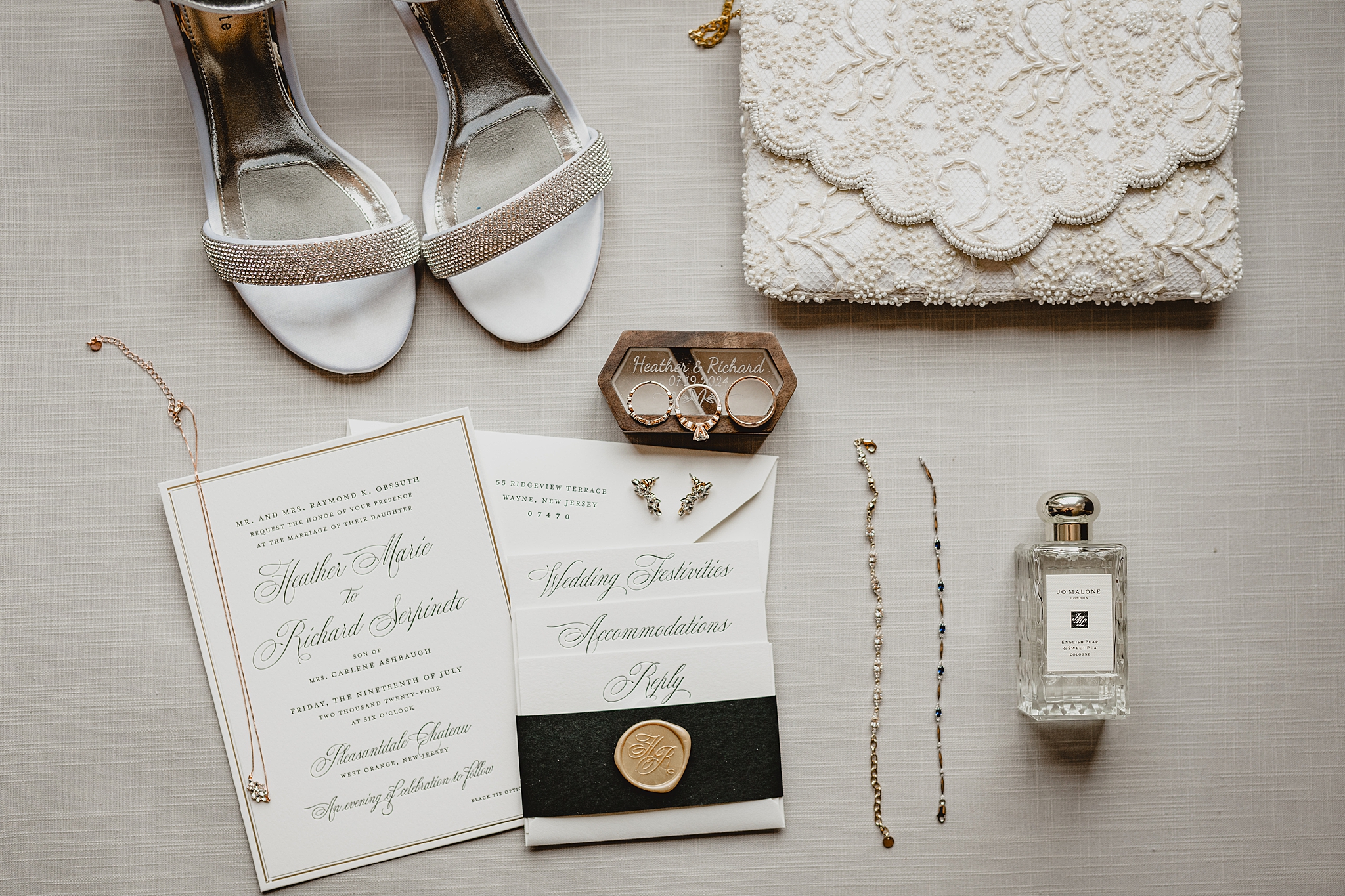 bride's shoes with black, gold, and ivory invitation suite for summer wedding at Pleasantdale Chateau