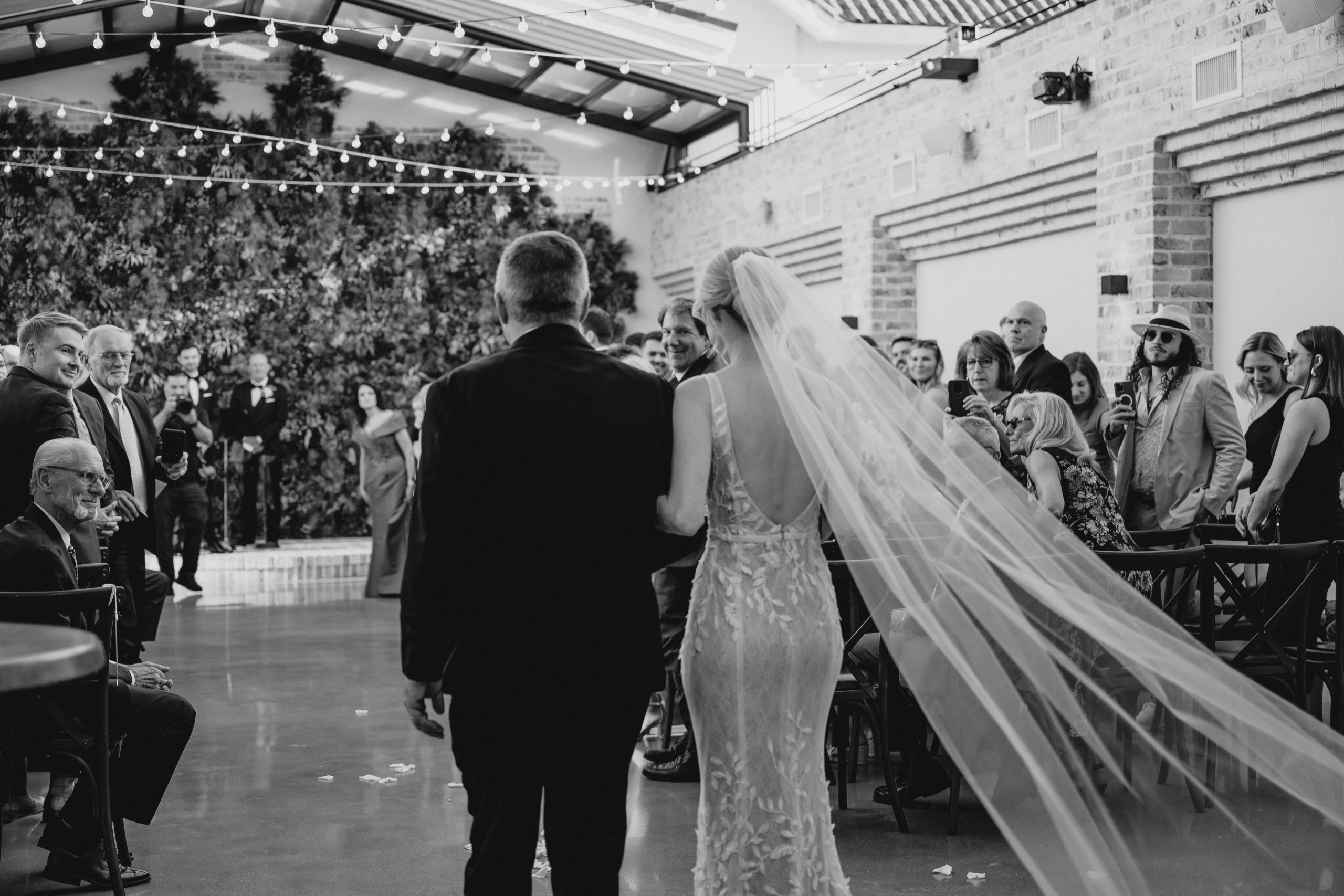 bride escorted by father walks down aisle for wedding ceremony in Andover NJ